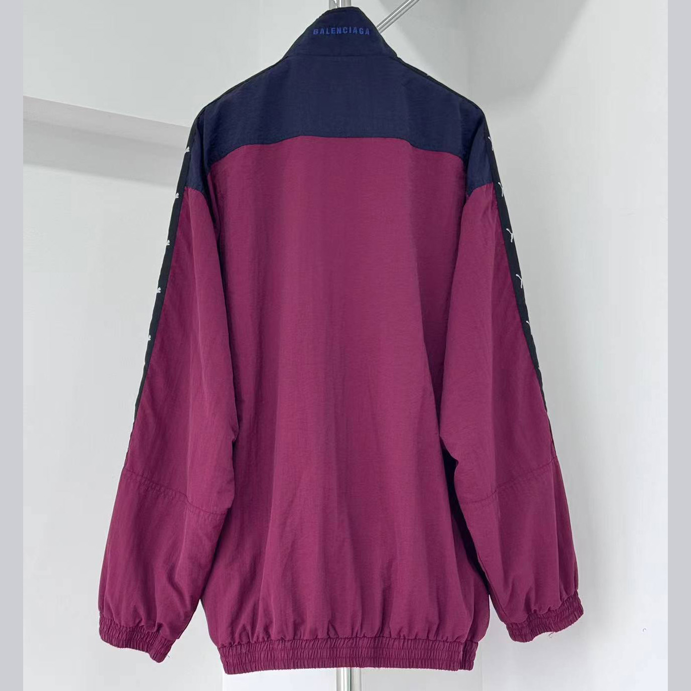 Balenciaga I PUMA Tracksuit Jacket in burgundy - FashionPlug