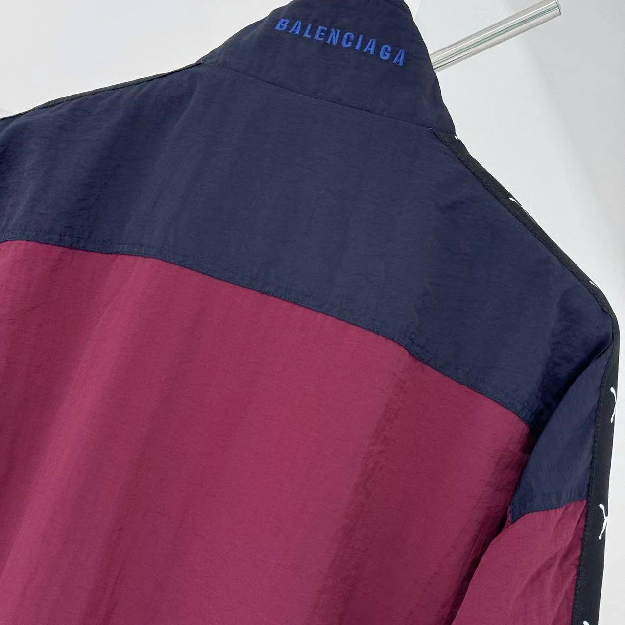 Balenciaga I PUMA Tracksuit Jacket in burgundy - FashionPlug