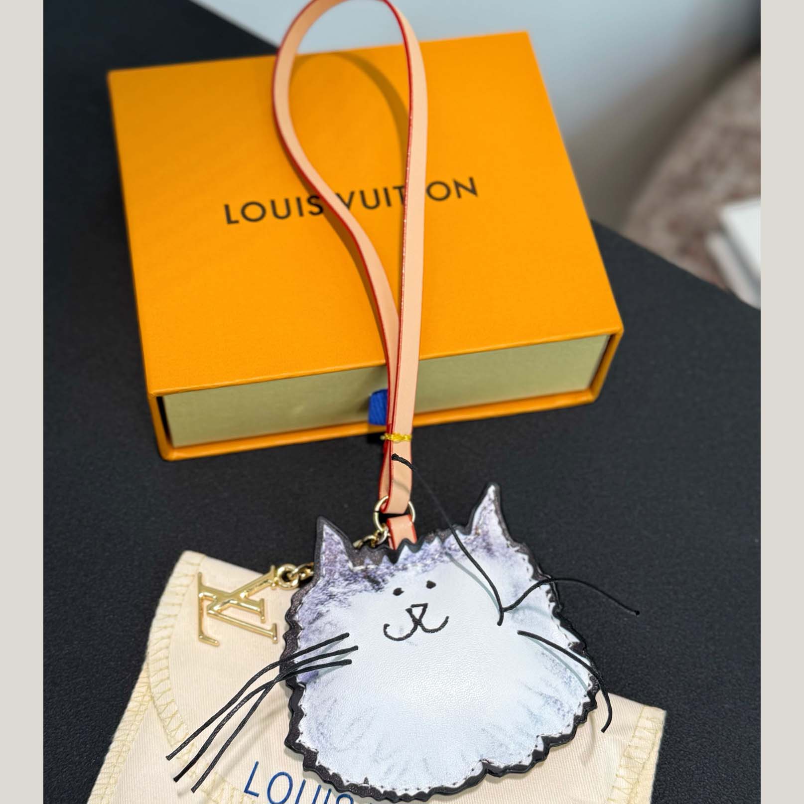 Louis Vuitton LV Cat Bag Charm   M02944   - FashionPlug
