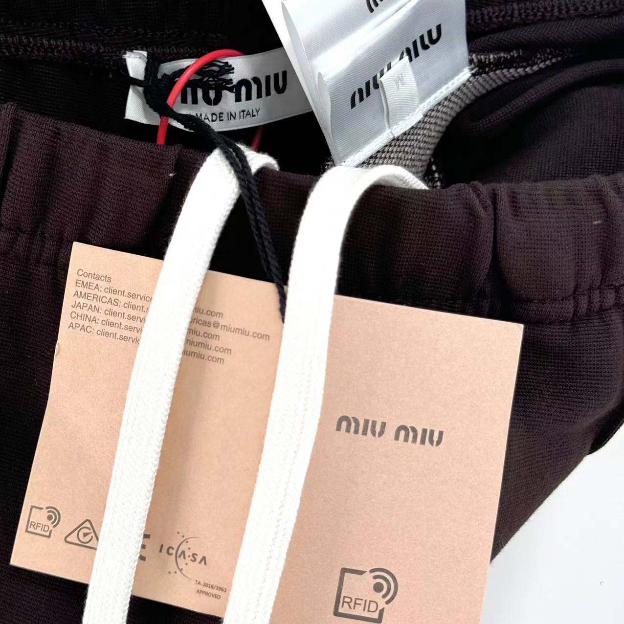 Miu Miu Jersey Pants - FashionPlug