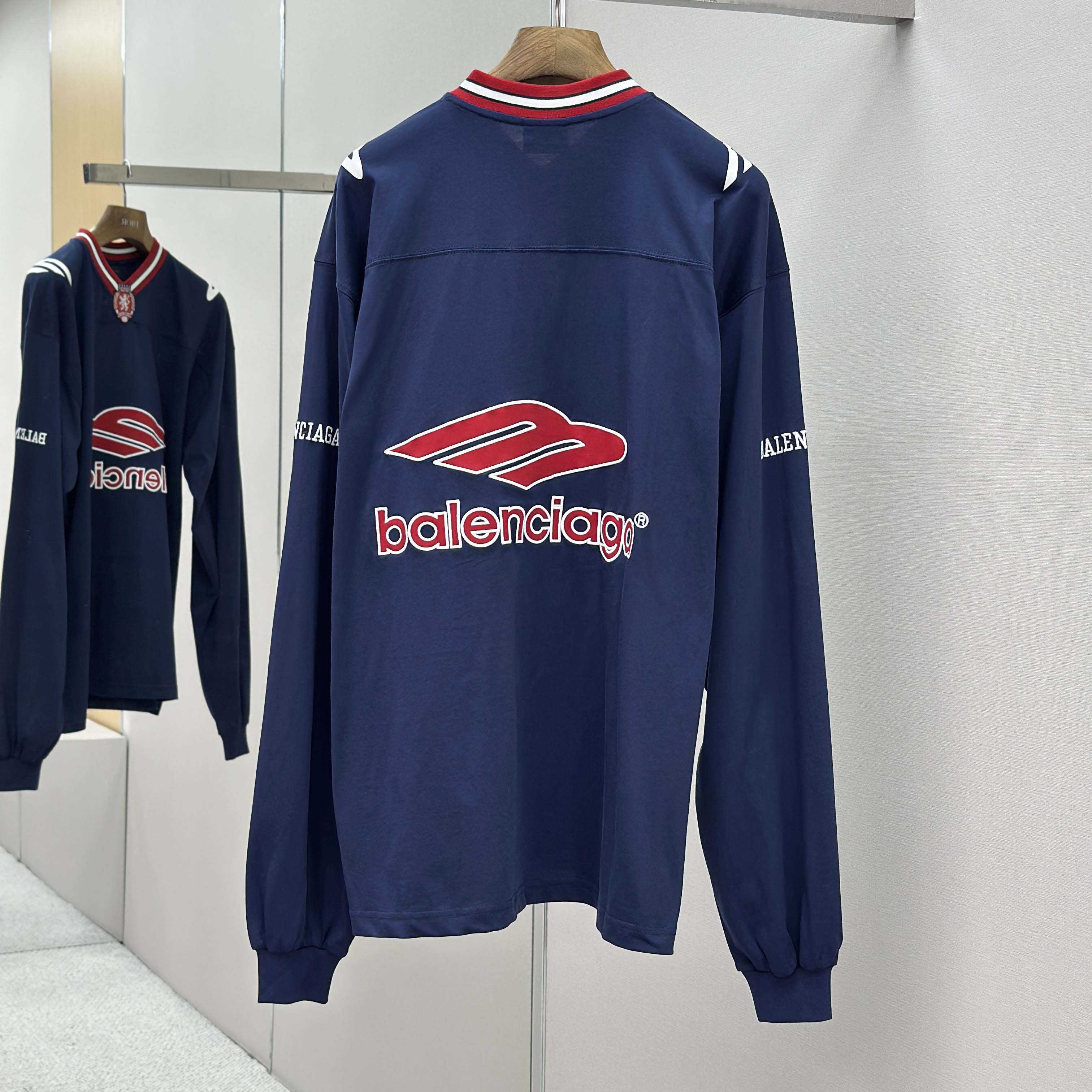 Balenciaga 3B Football Long Sleeve V-Neck T-Shirt In Dark Navy  - FashionPlug