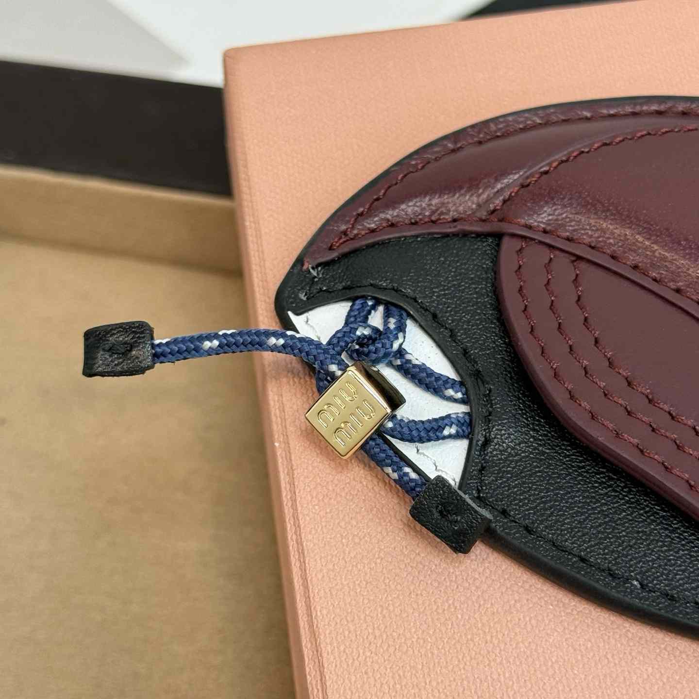 Miu Miu Leather Key Ring Trick - FashionPlug