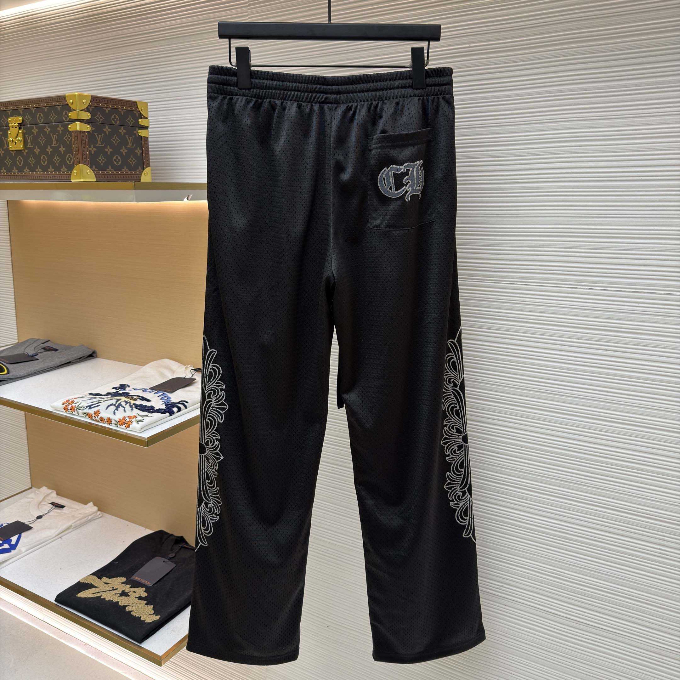 Chrome Hearts black mesh warm-up track pants - FashionPlug
