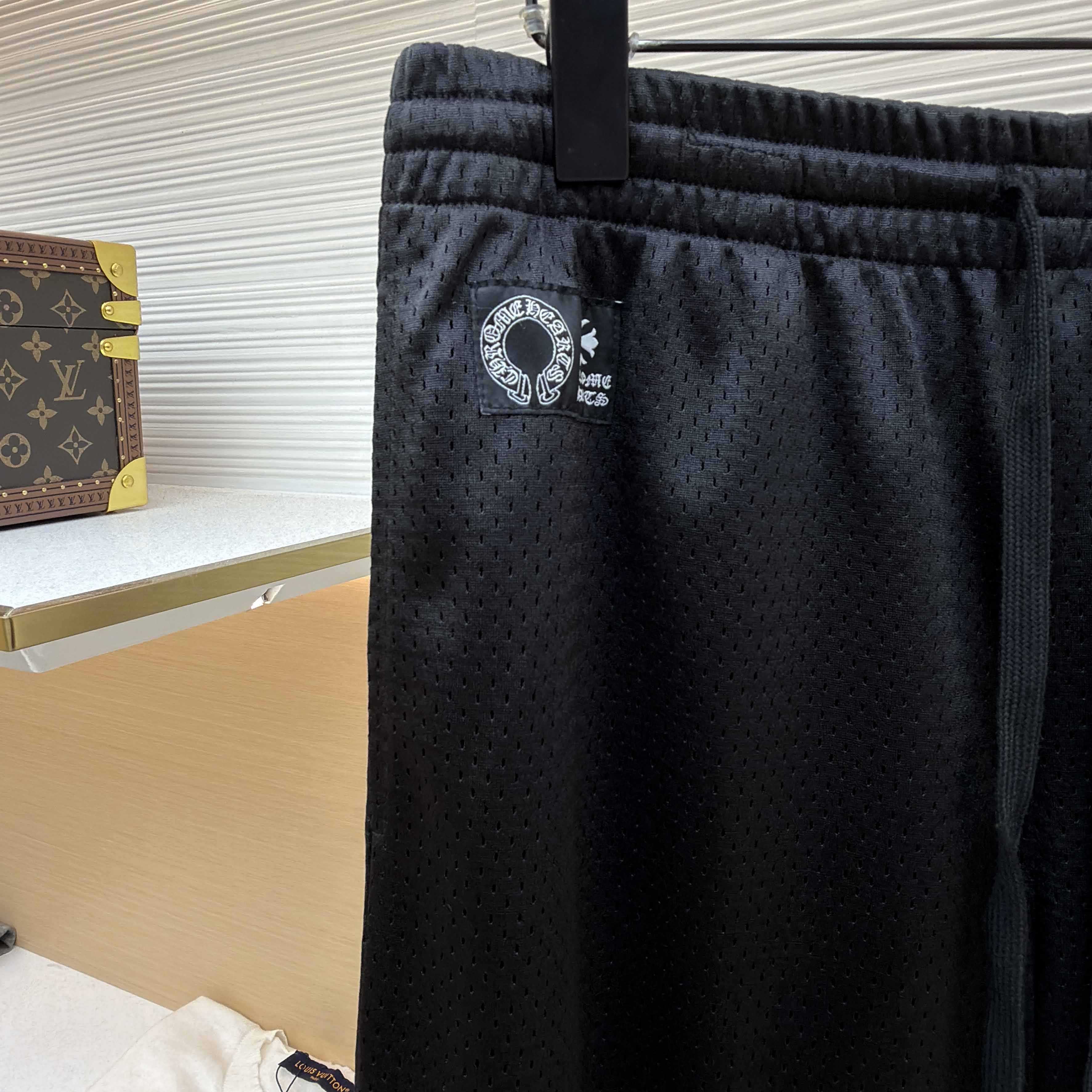 Chrome Hearts black mesh warm-up track pants - FashionPlug