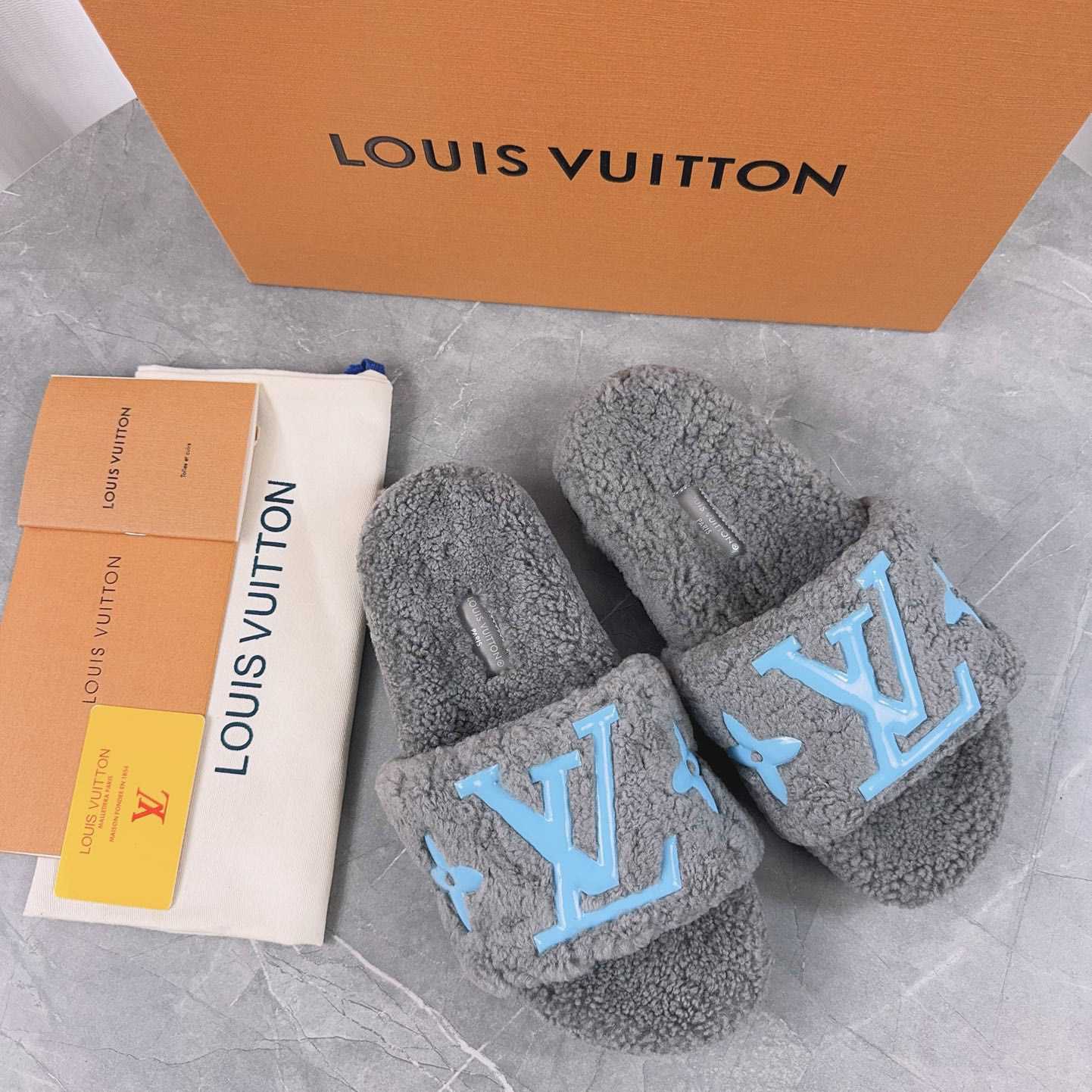 Louis Vuitton Fuzzy Slippers - FashionPlug