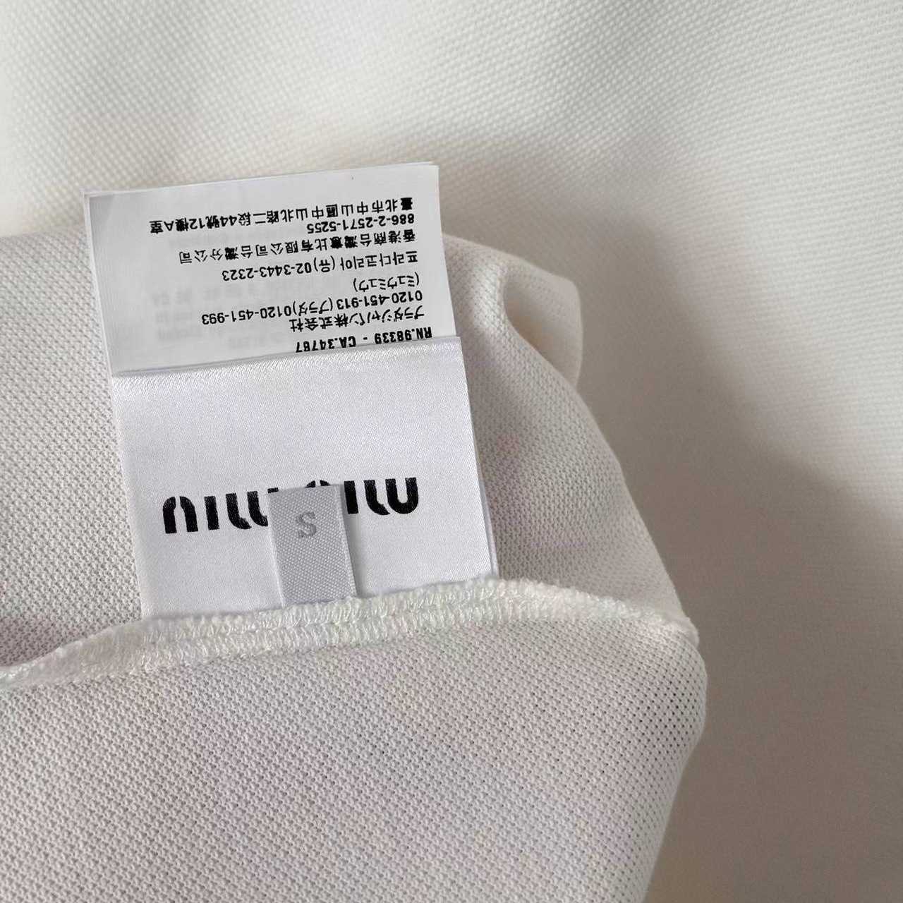 Miu Miu Ribbed Trim Zippered Polo Shirt - FashionPlug