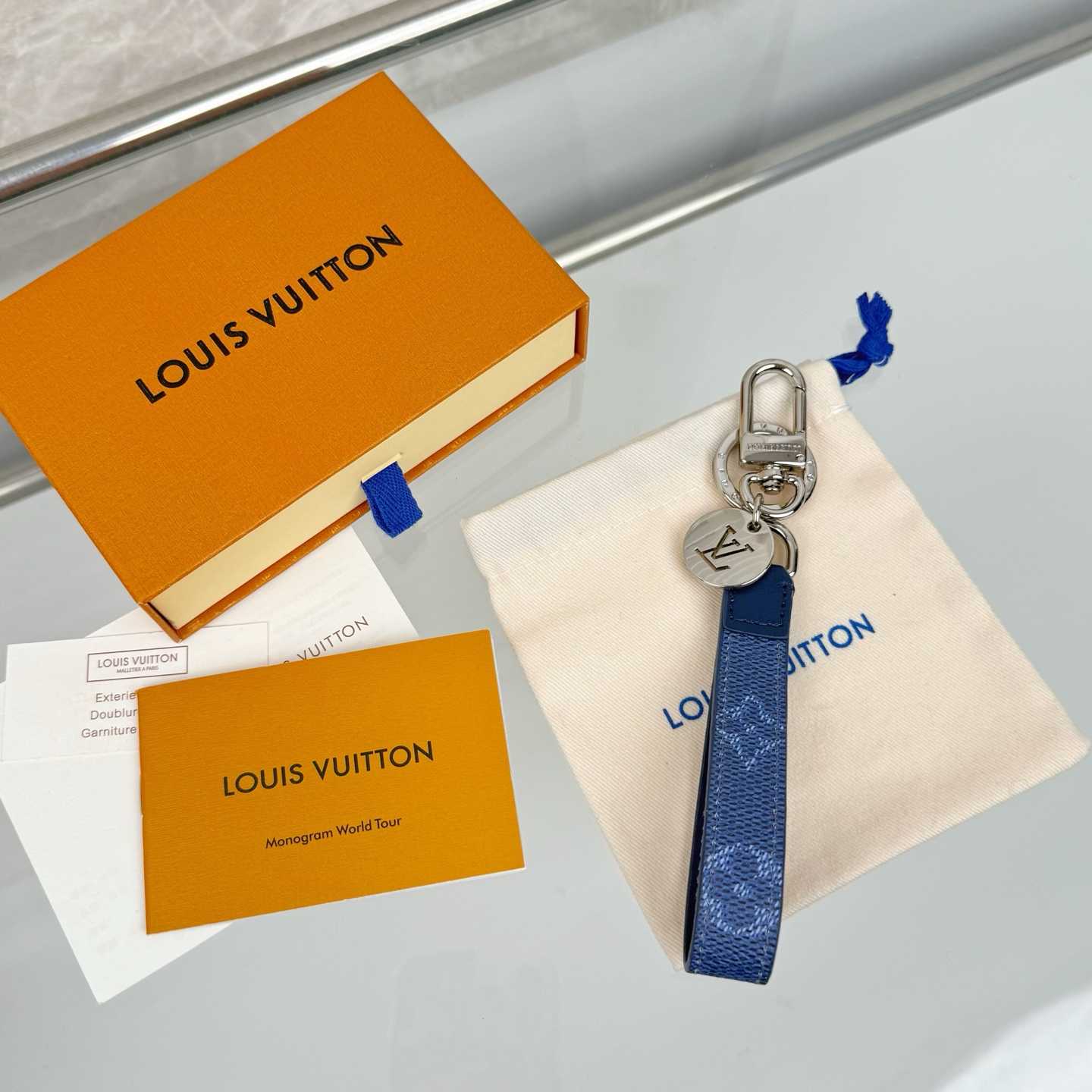 Louis Vuitton LV Slim Dragonne Key Holder and Bag Charm S00  - FashionPlug