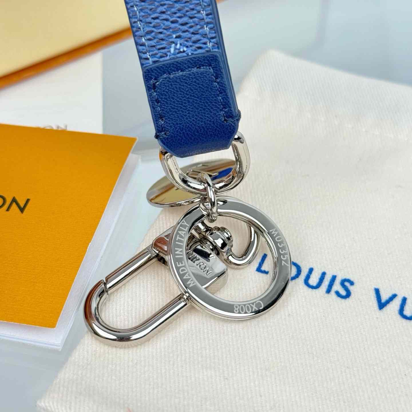 Louis Vuitton LV Slim Dragonne Key Holder and Bag Charm S00  - FashionPlug