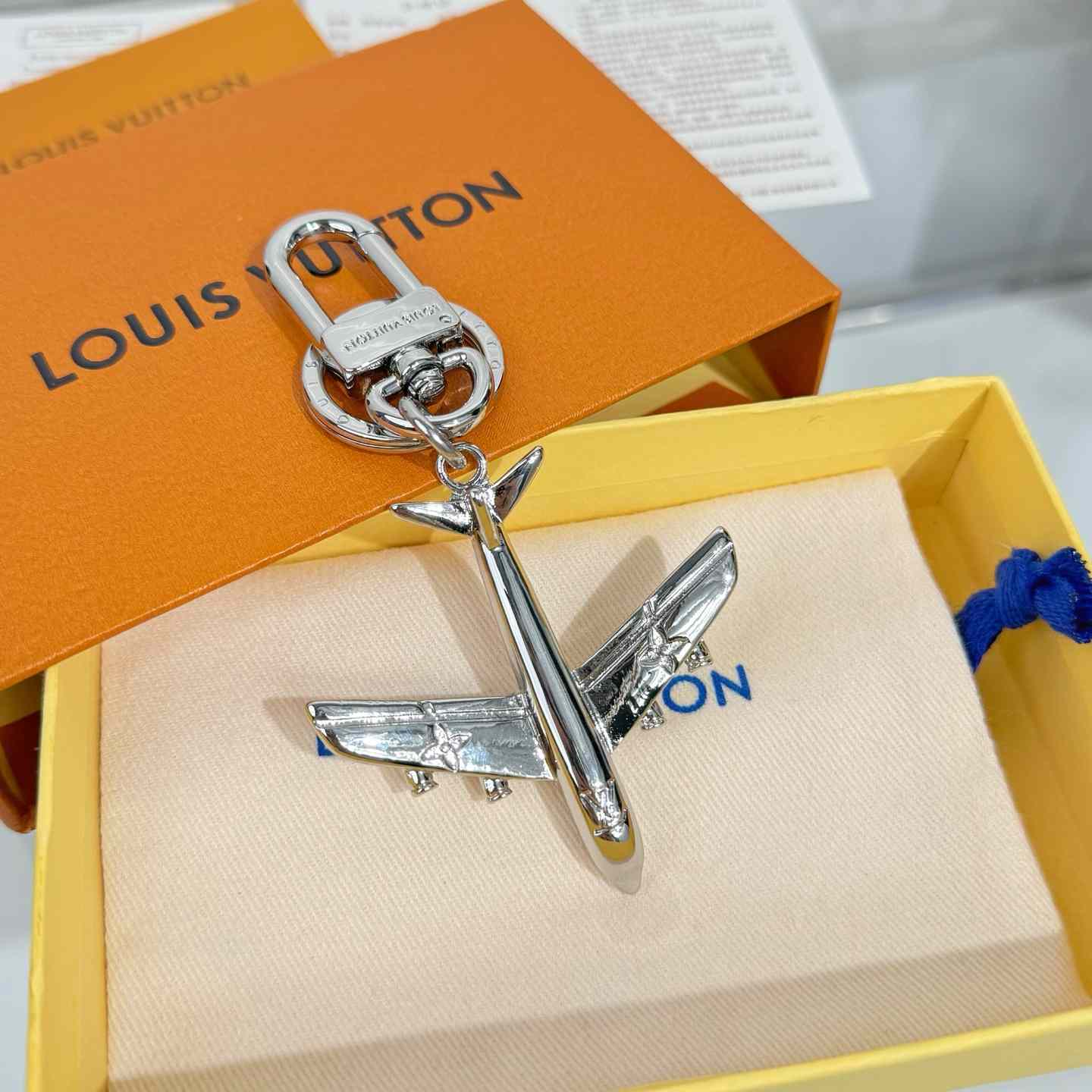 Louis Vuitton LV Plane Key Holder and Bag Charm S00 - FashionPlug