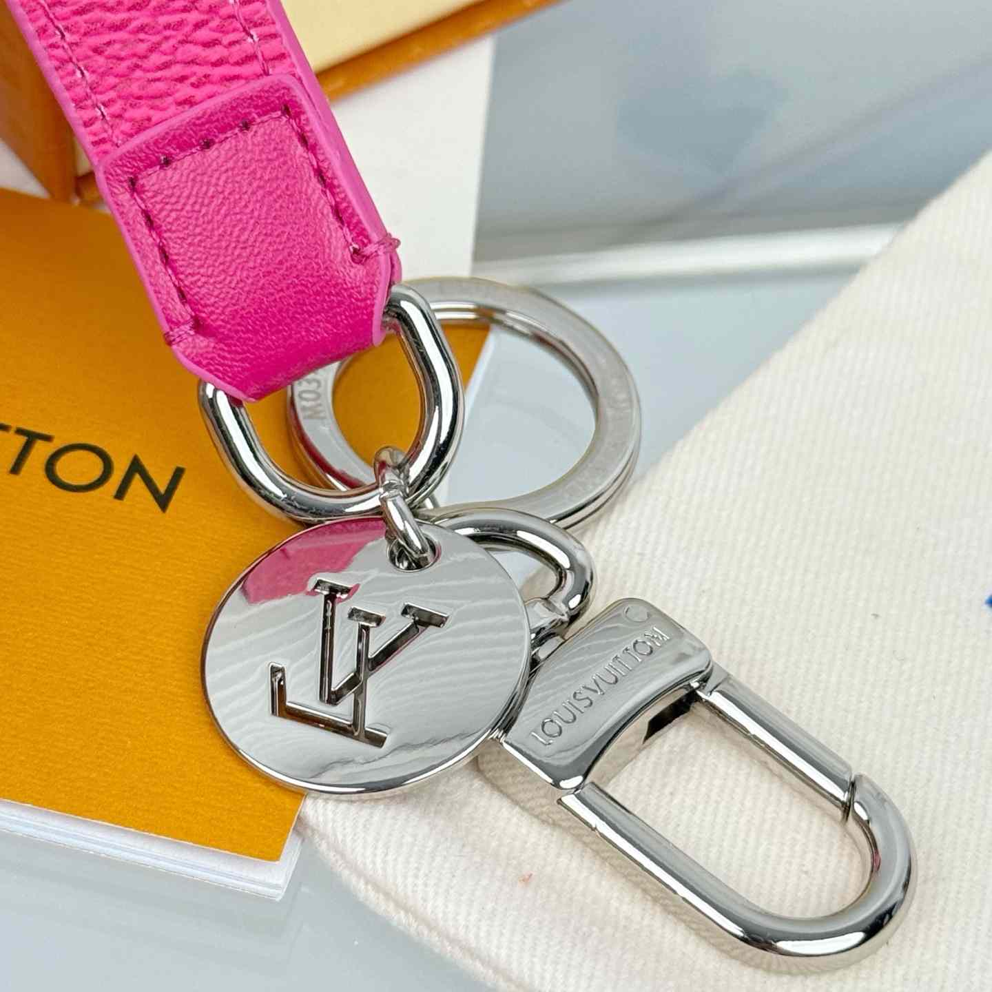 Louis Vuitton LV Slim Dragonne Key Holder and Bag Charm S00  - FashionPlug