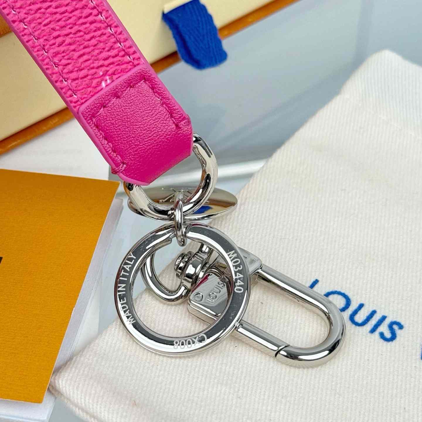 Louis Vuitton LV Slim Dragonne Key Holder and Bag Charm S00  - FashionPlug