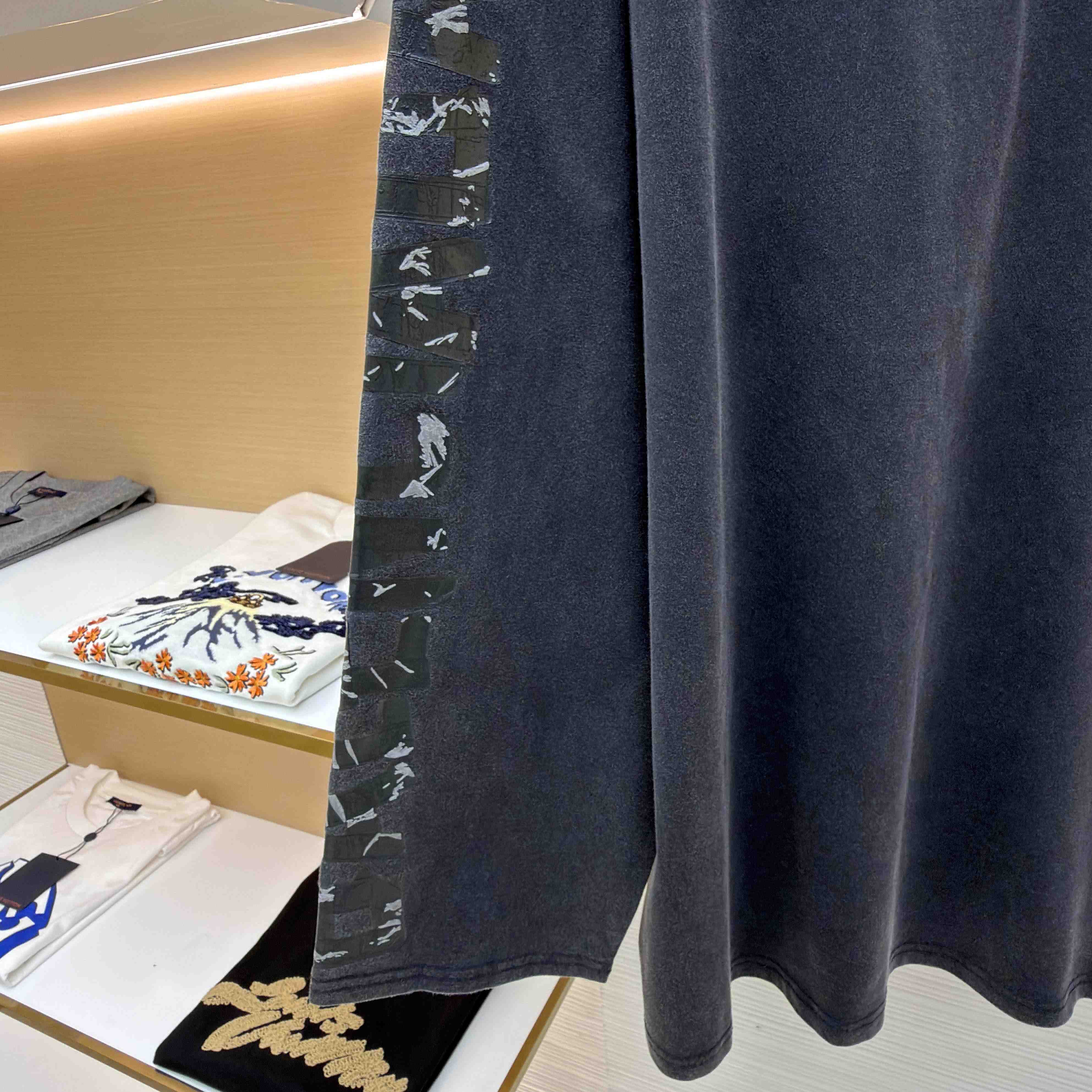 Balenciaga Men's Transparent Tape Shifted Oversized Long Sleeve T-shirt - FashionPlug