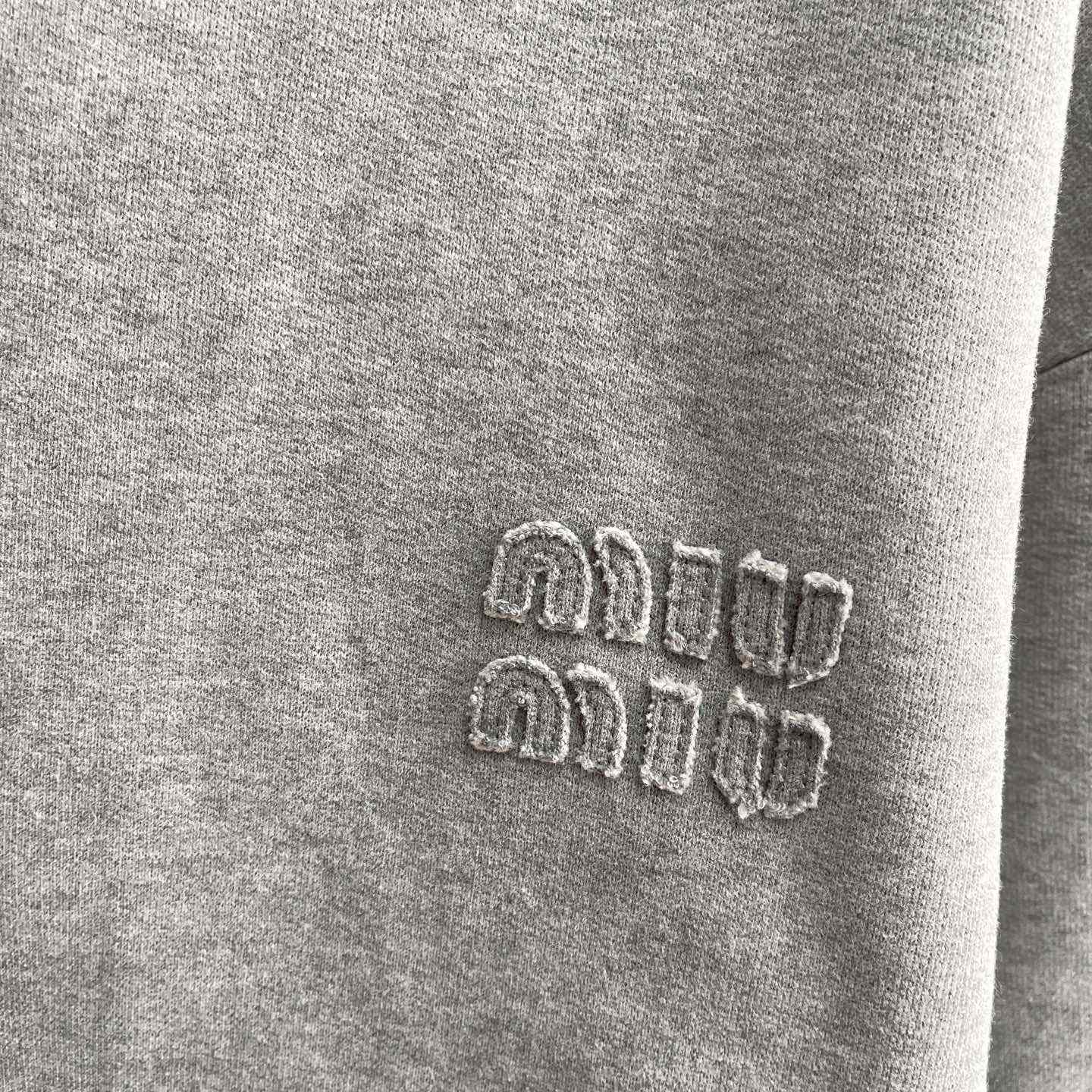 Miu Miu Logo-appliqué Cotton Hoodie     80002 - FashionPlug