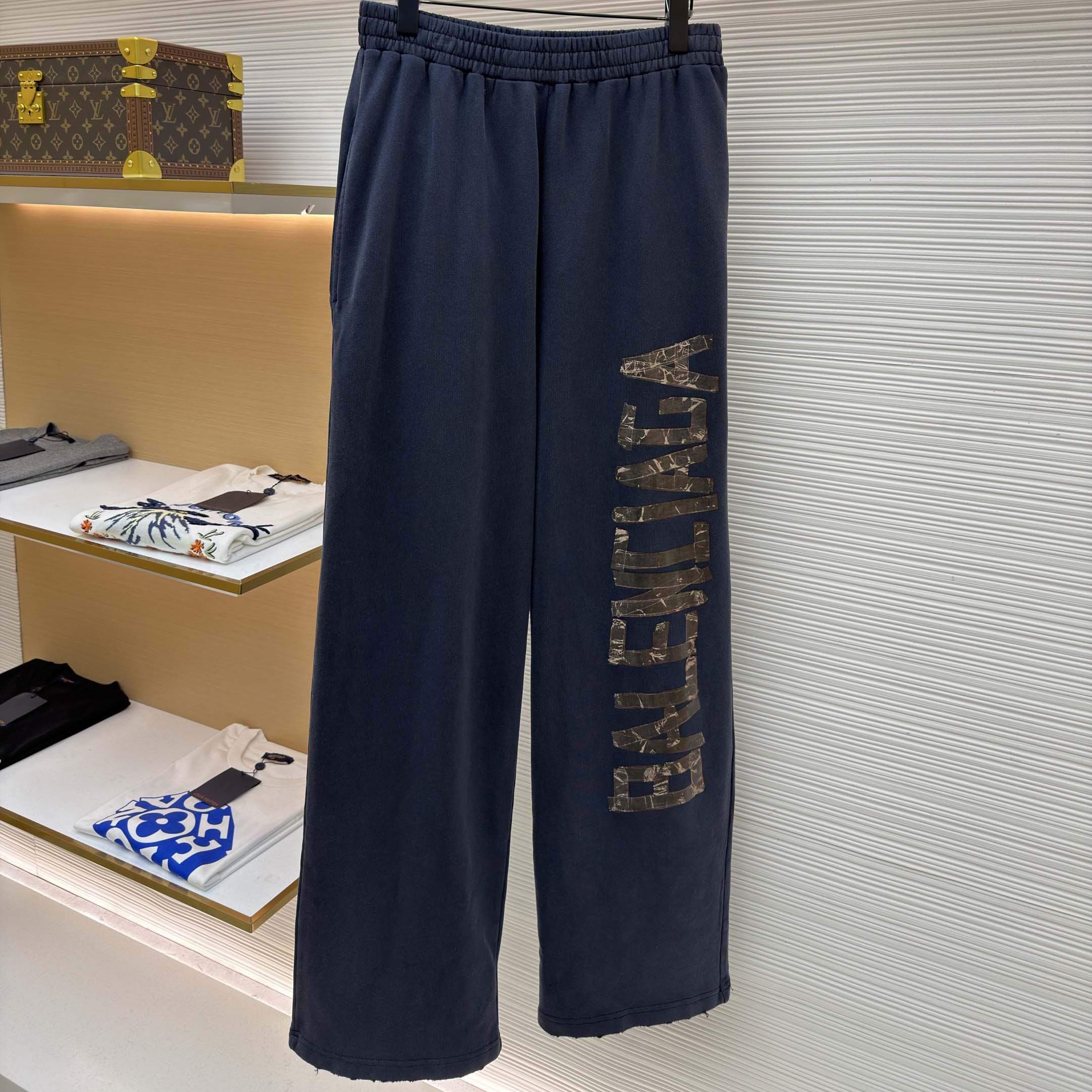 Balenciaga Transparent Tape Baggy Pants In Faded Black - FashionPlug