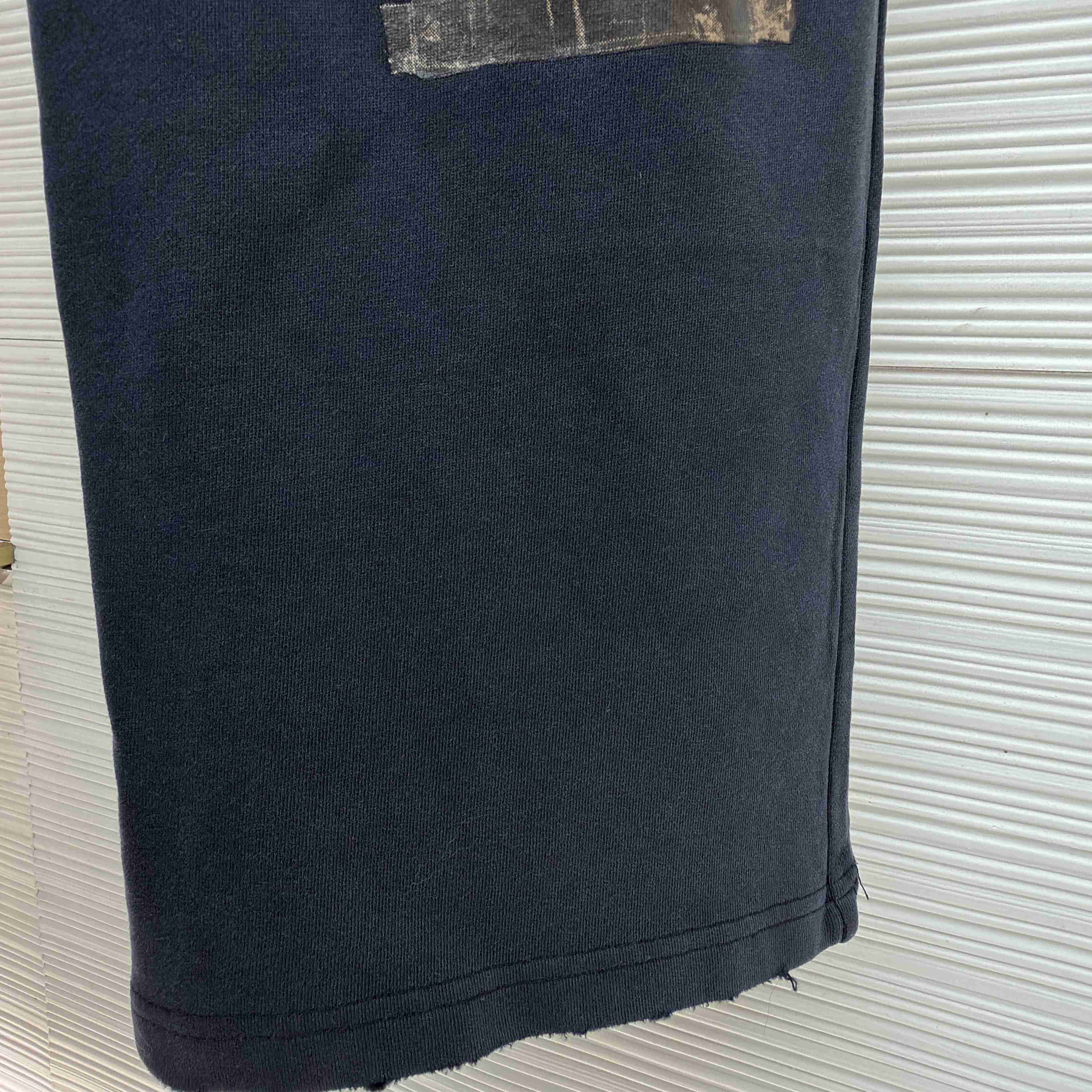 Balenciaga Transparent Tape Baggy Pants In Faded Black - FashionPlug