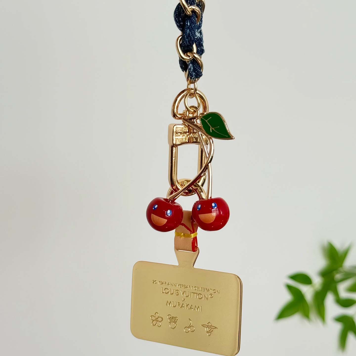 Louis Vuitton LV x TM Denim Cerise Phone Holder S00   M02623 - FashionPlug