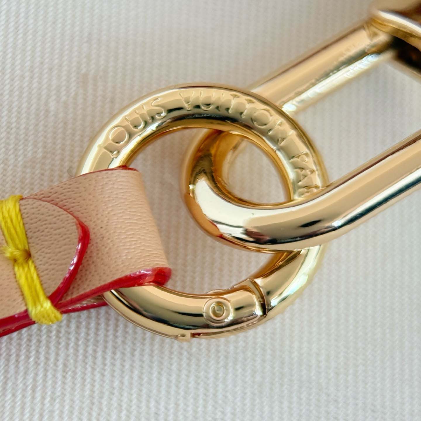 Louis Vuitton LV x TM Denim Cerise Phone Holder S00   M02623 - FashionPlug