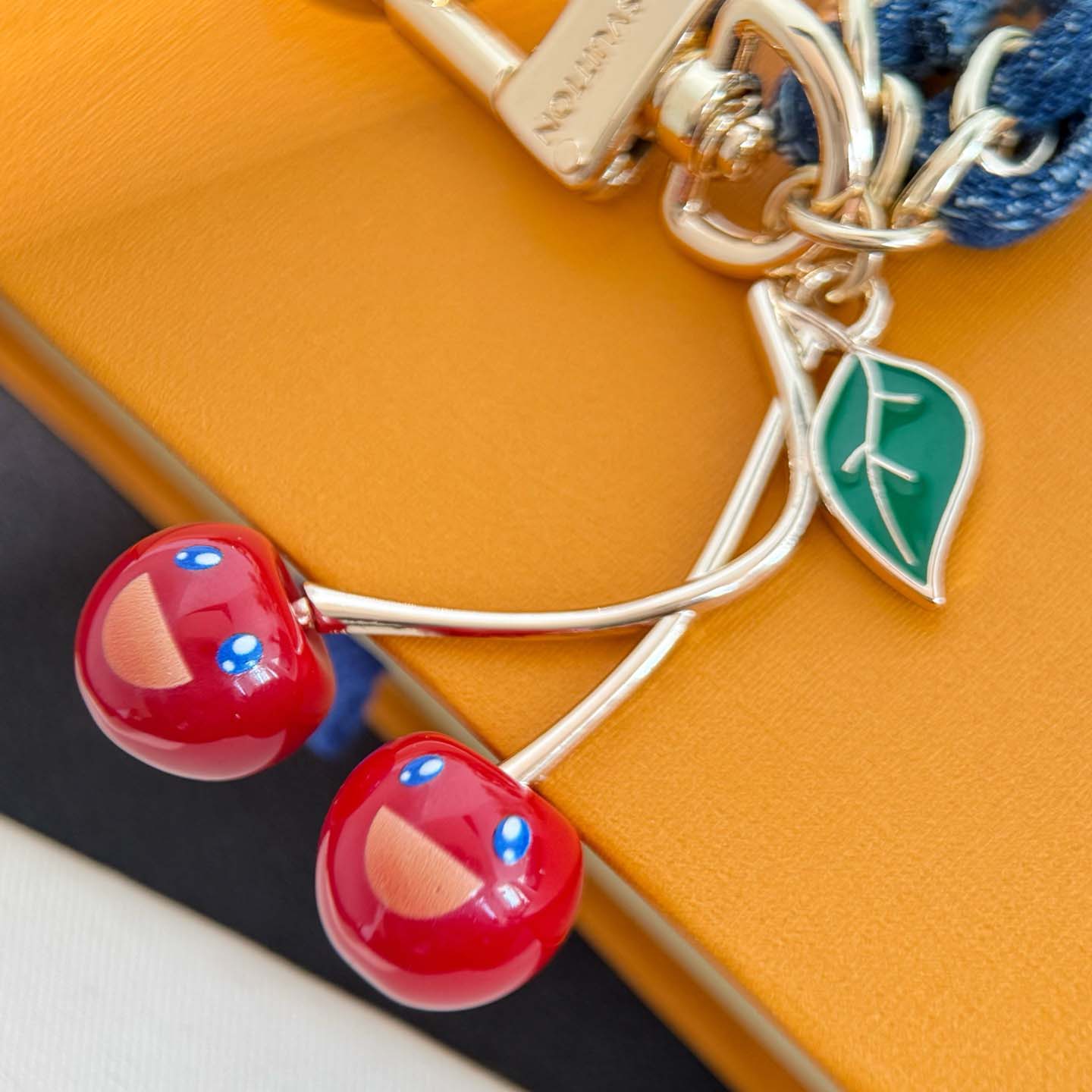 Louis Vuitton LV x TM Denim Cerise Phone Holder S00   M02623 - FashionPlug