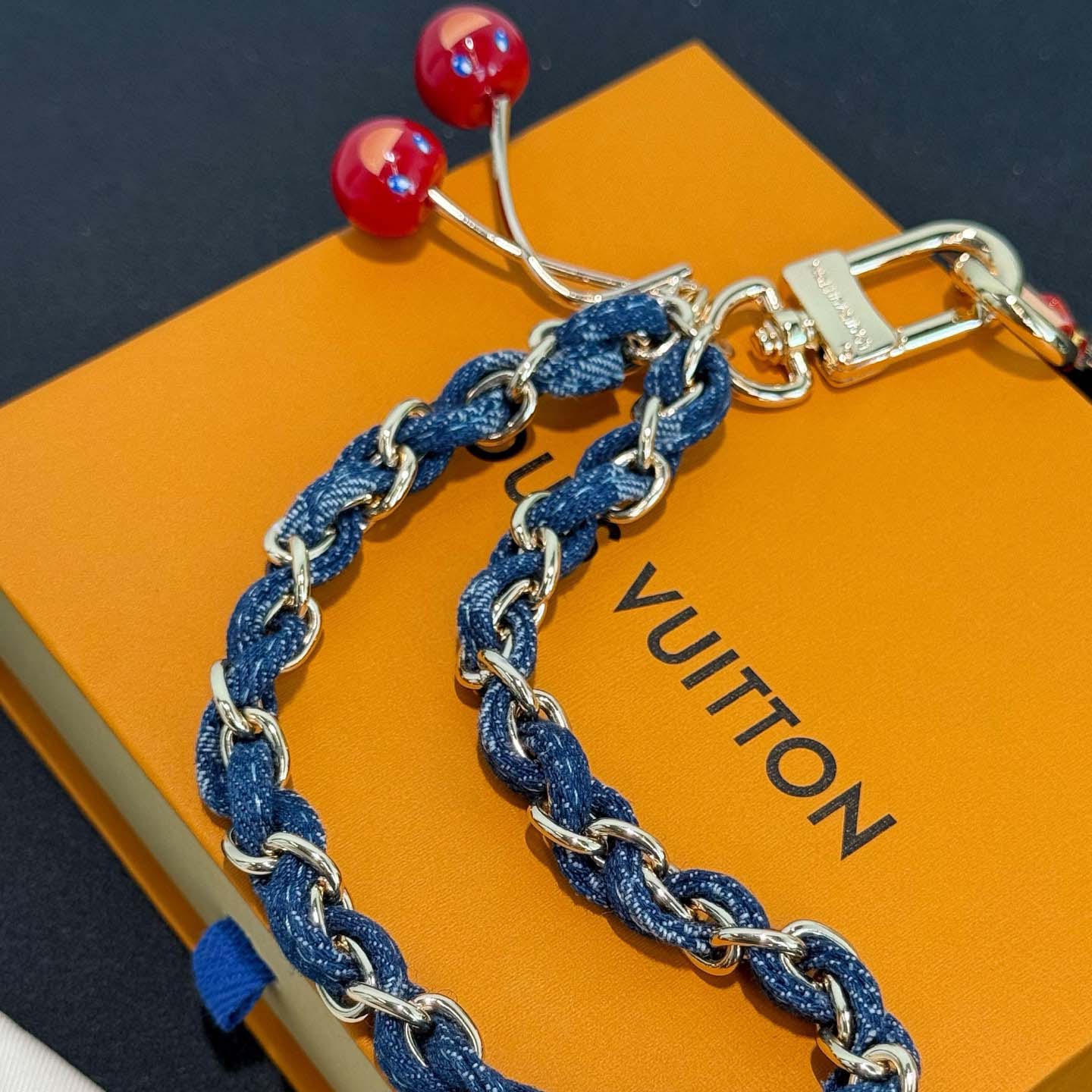 Louis Vuitton LV x TM Denim Cerise Phone Holder S00   M02623 - FashionPlug