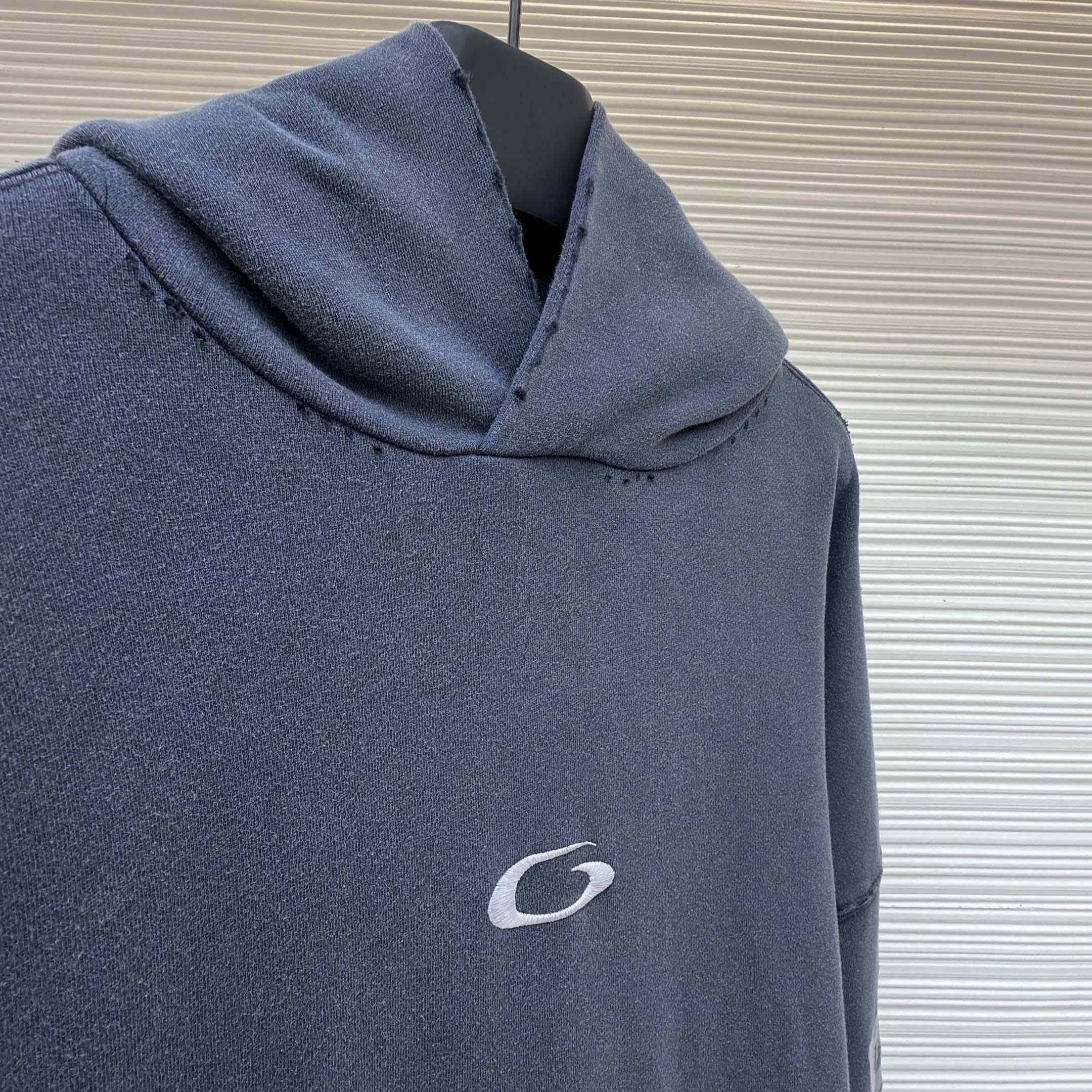 Balenciaga Transparent Tape Ripped Pocket Hoodie In Faded Black - FashionPlug