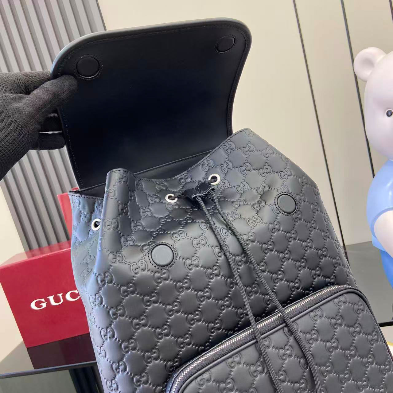 Gucci Emblem Medium Backpack 854750 - FashionPlug