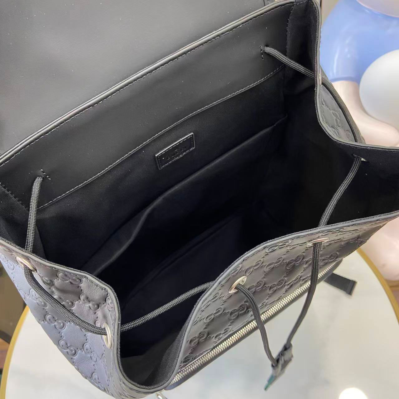 Gucci Emblem Medium Backpack 854750 - FashionPlug