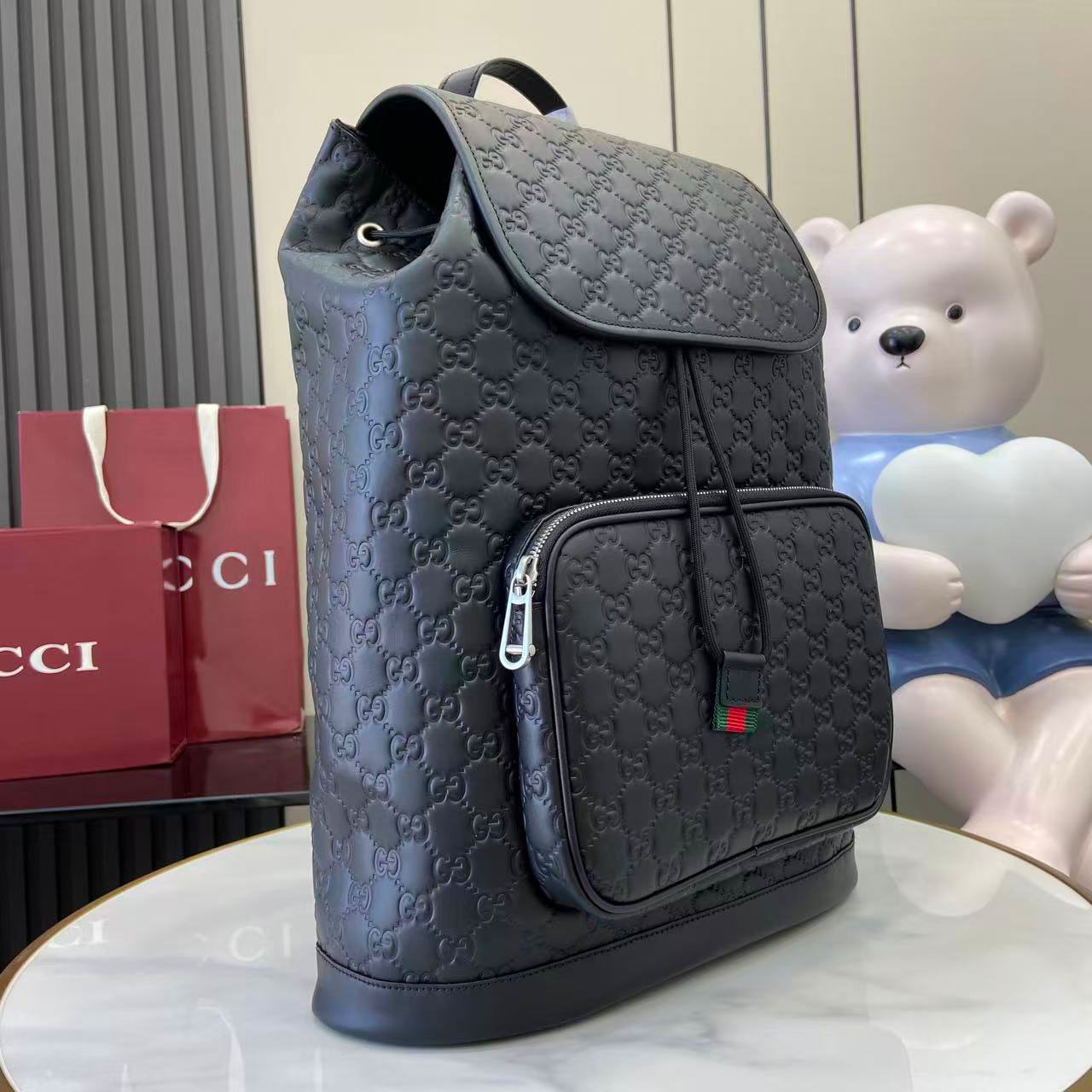 Gucci Emblem Medium Backpack 854750 - FashionPlug