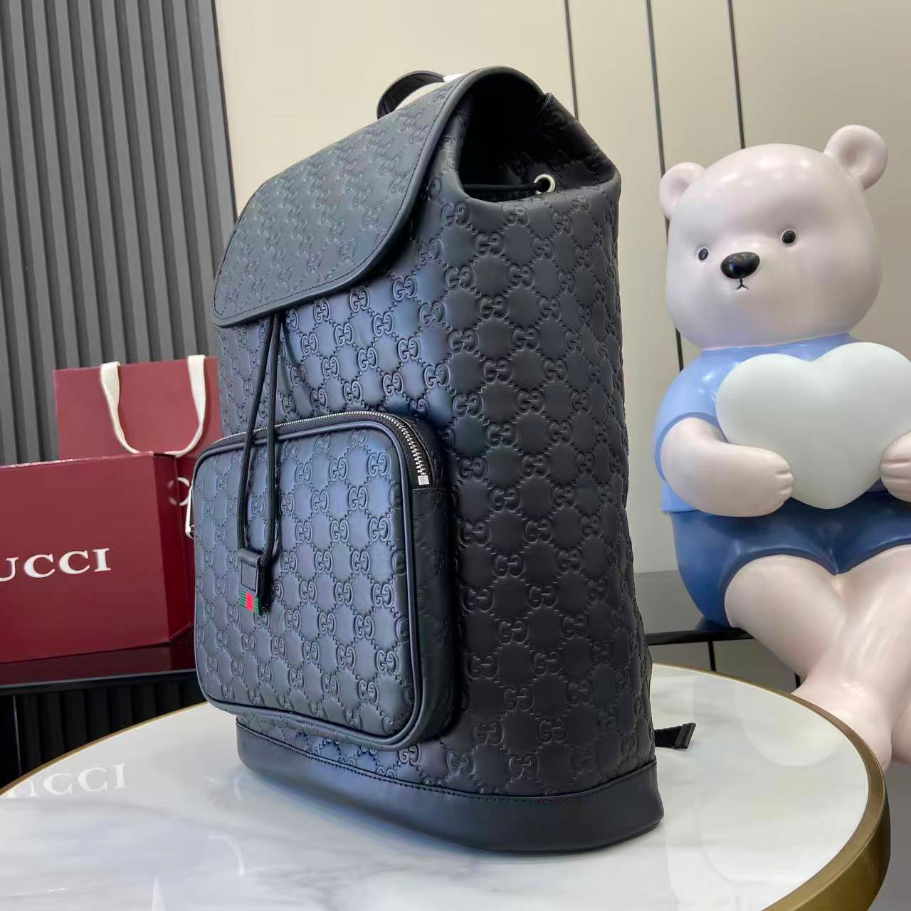 Gucci Emblem Medium Backpack 854750 - FashionPlug