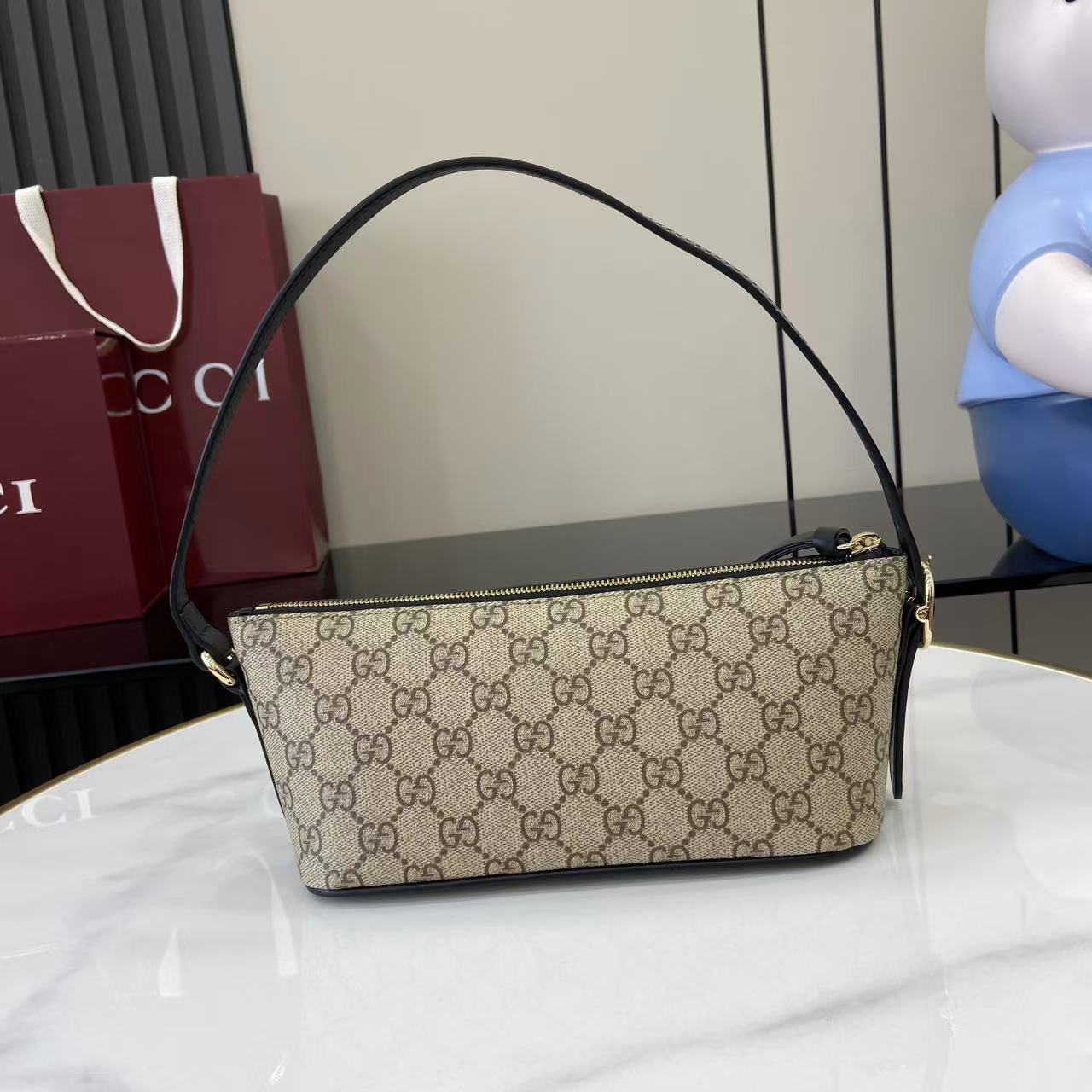 Gucci GG Emblem Small Shoulder Bag - FashionPlug