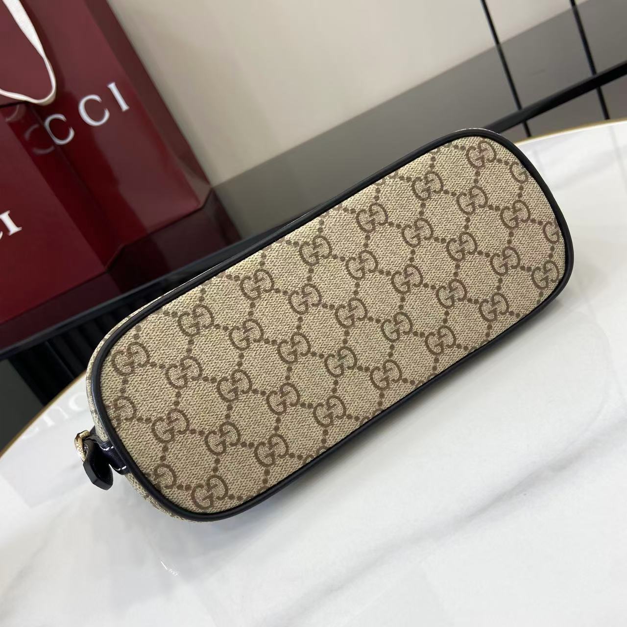 Gucci GG Emblem Small Shoulder Bag - FashionPlug