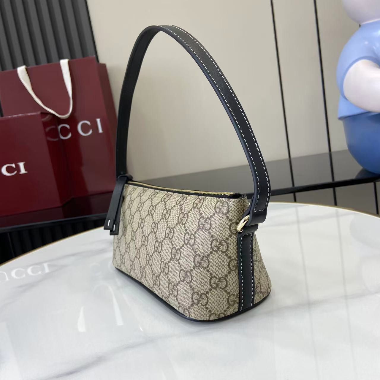Gucci GG Emblem Small Shoulder Bag - FashionPlug