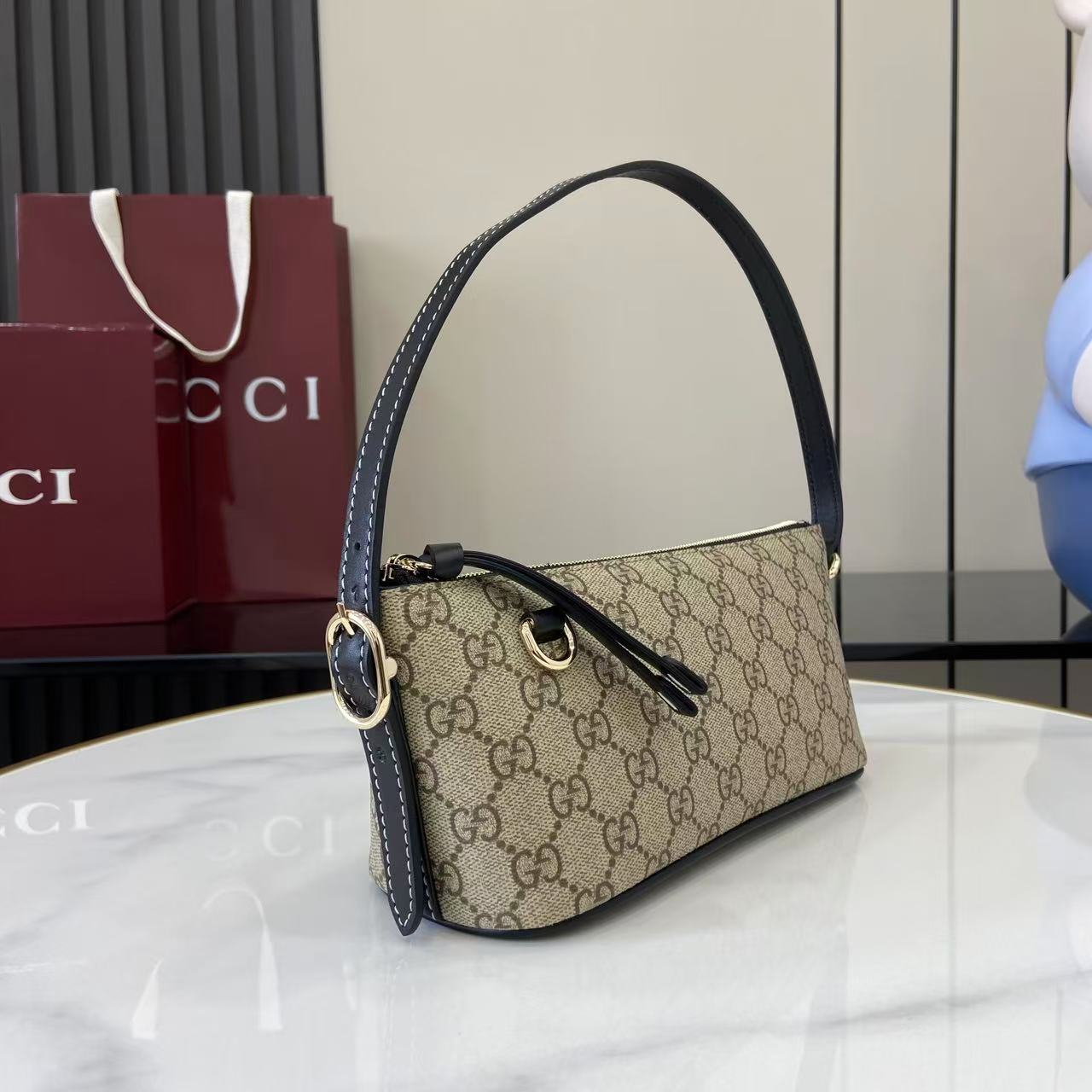 Gucci GG Emblem Small Shoulder Bag - FashionPlug