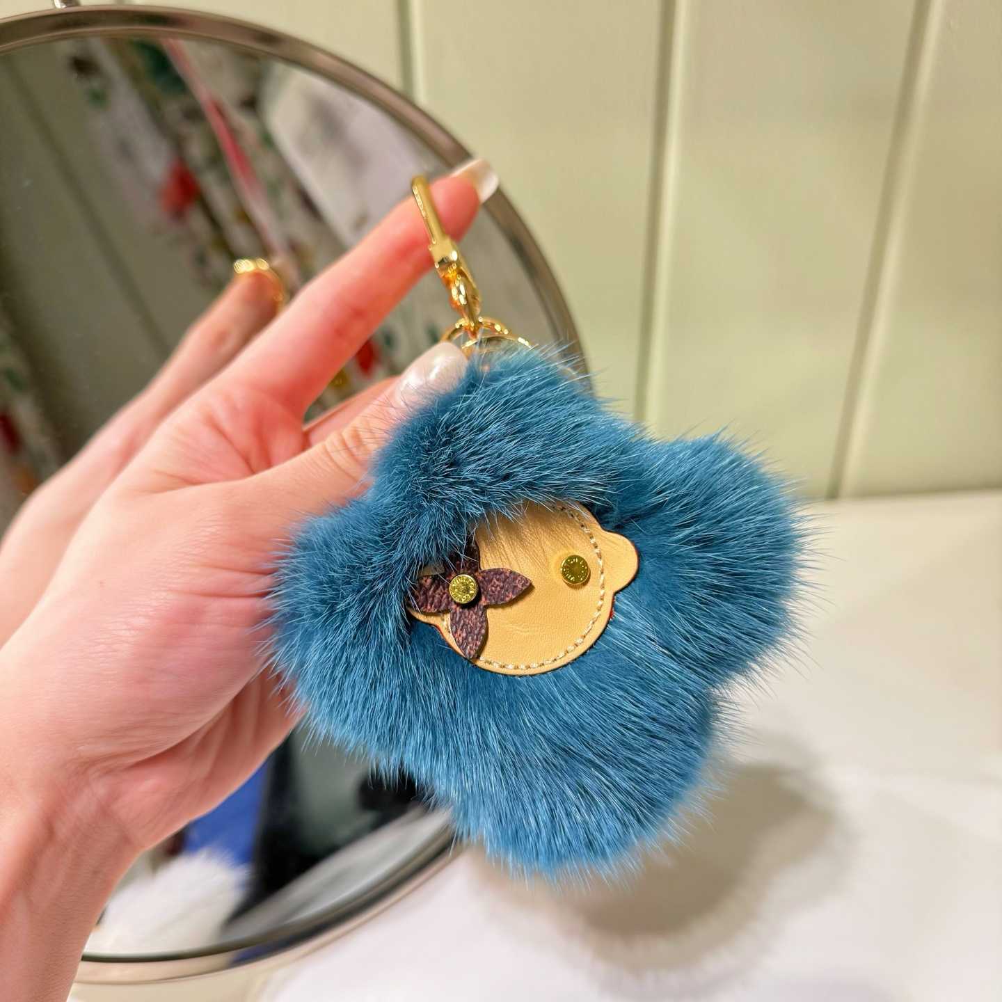 Louis Vuitton Vivienne Fur Key Holder   M03820 - FashionPlug