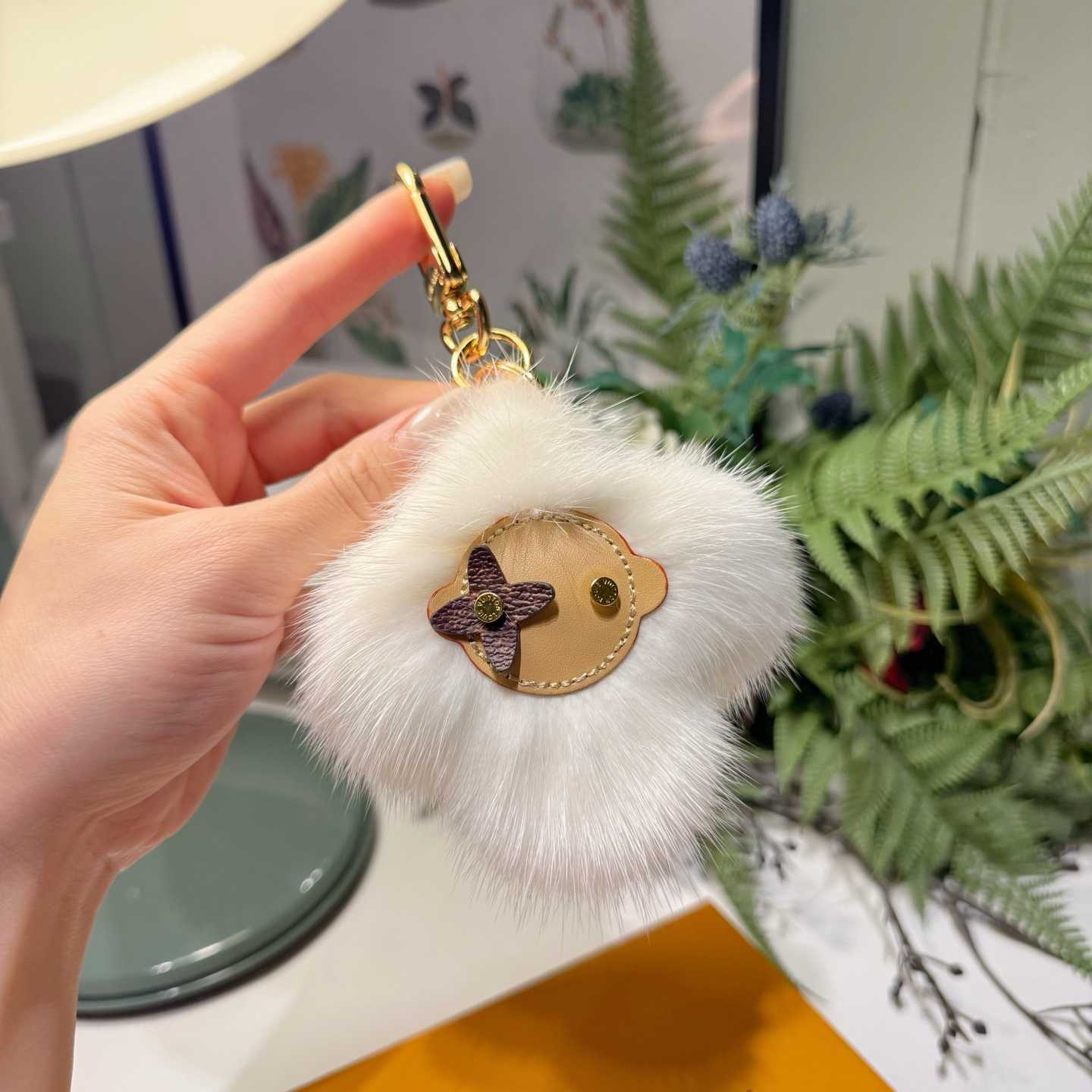 Louis Vuitton Vivienne Fur Key Holder   M02300 - FashionPlug