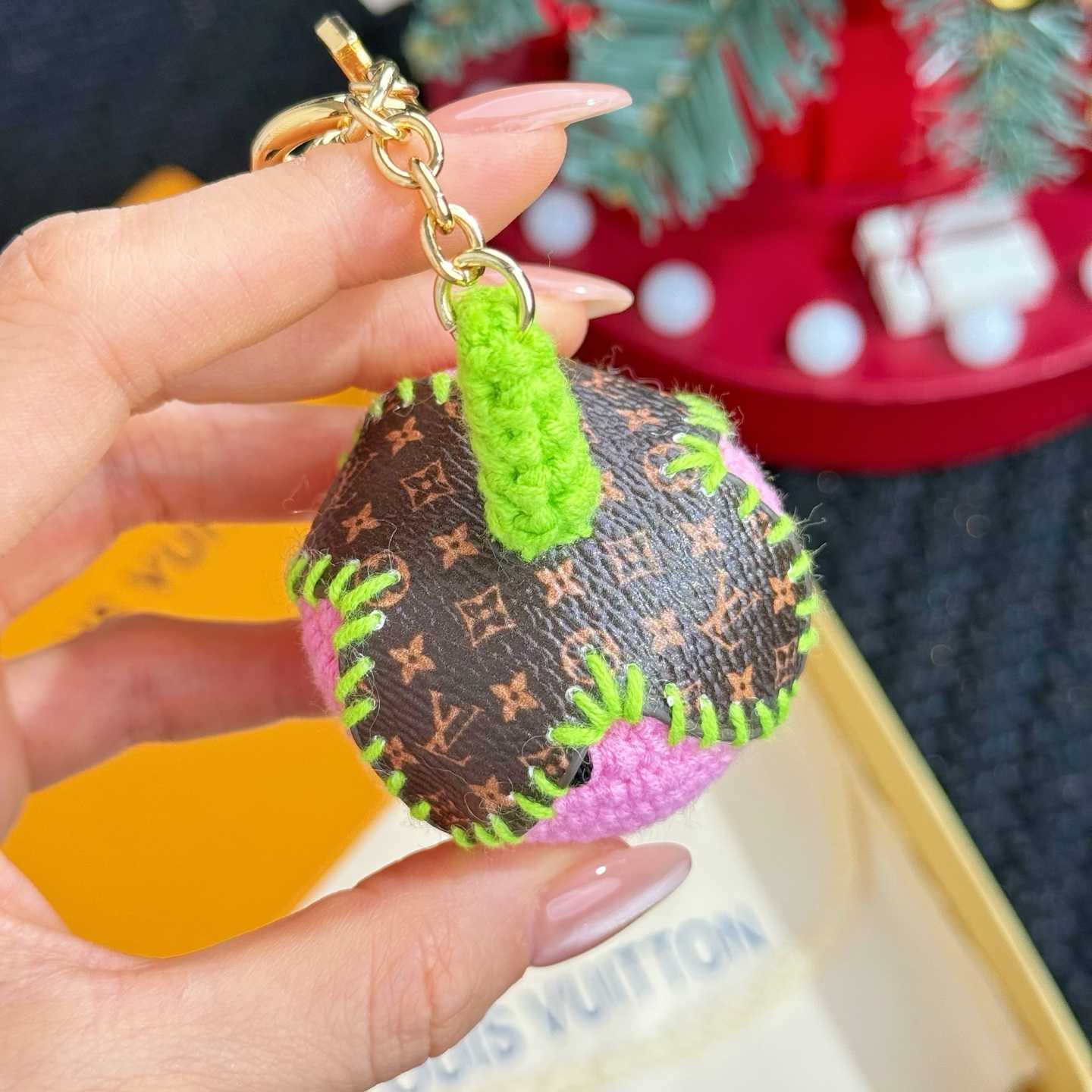 Louis Vuitton Berrylicious Crochet Bag Charm   M02583 - FashionPlug