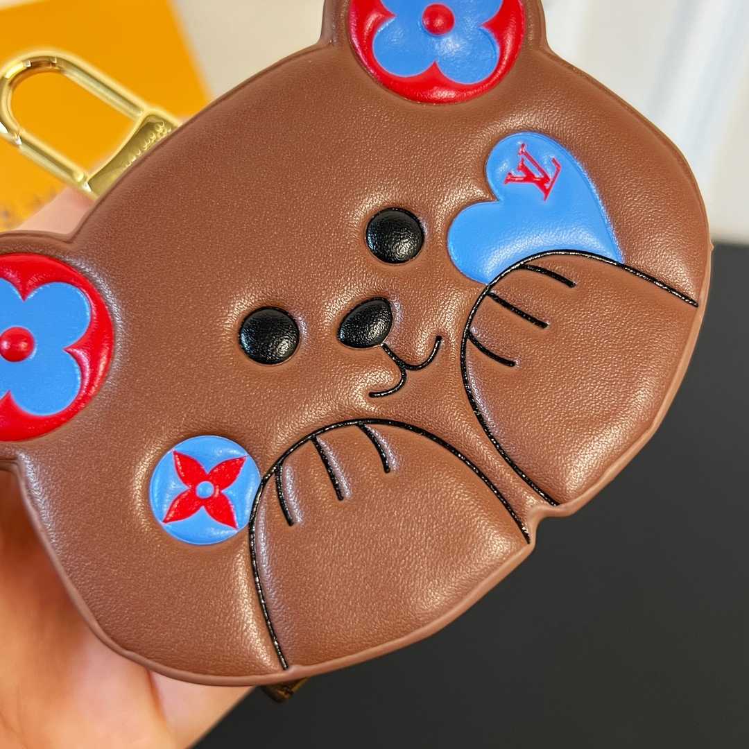 Louis Vuitton Monogram Teddy Bear Earphone Case   - FashionPlug