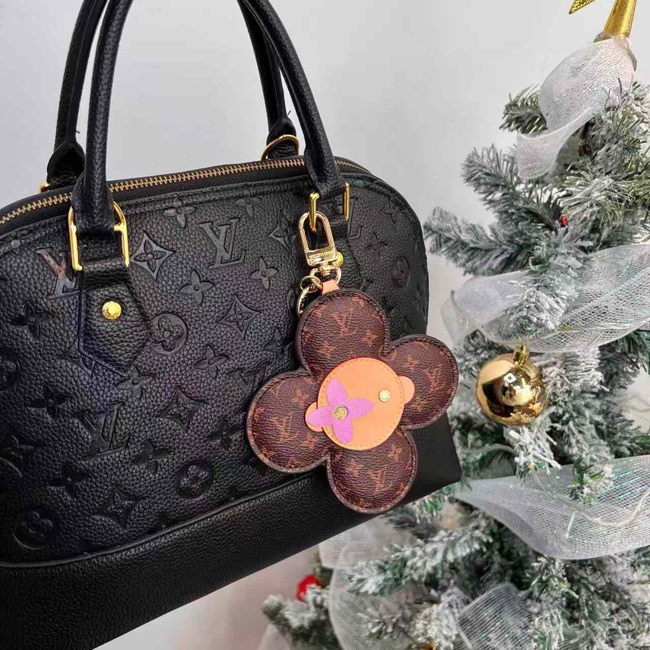 Louis Vuitton Vivienne Bag Charm   M03818 - FashionPlug