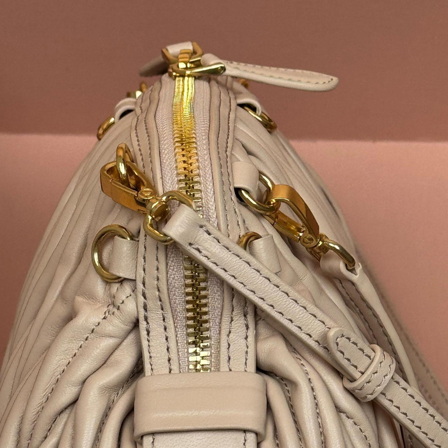 Miu Miu Caprice Matelassé Nappa Leather Clutch - FashionPlug