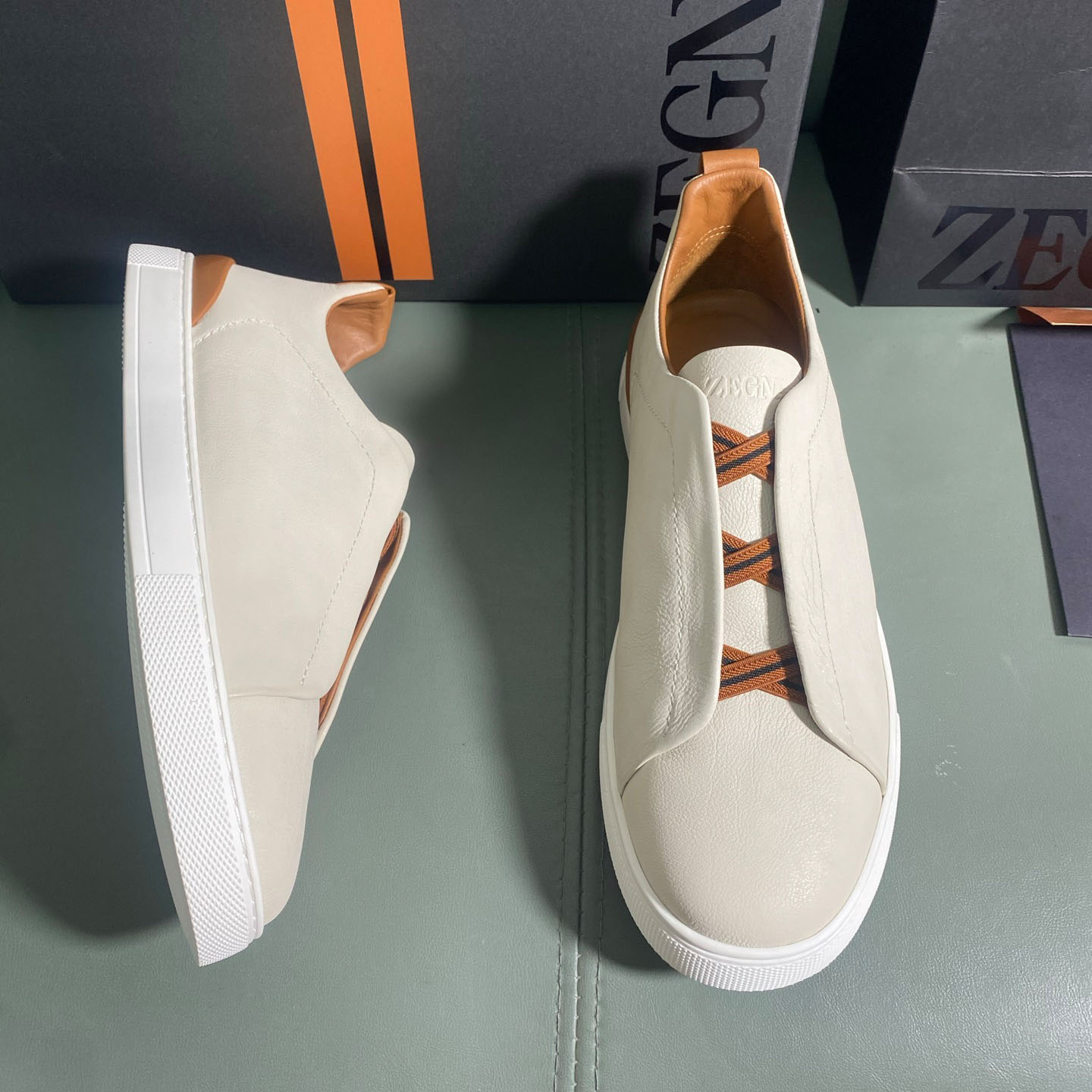 Zegna Off White Deerskin Triple Stitch™ Sneakers - FashionPlug