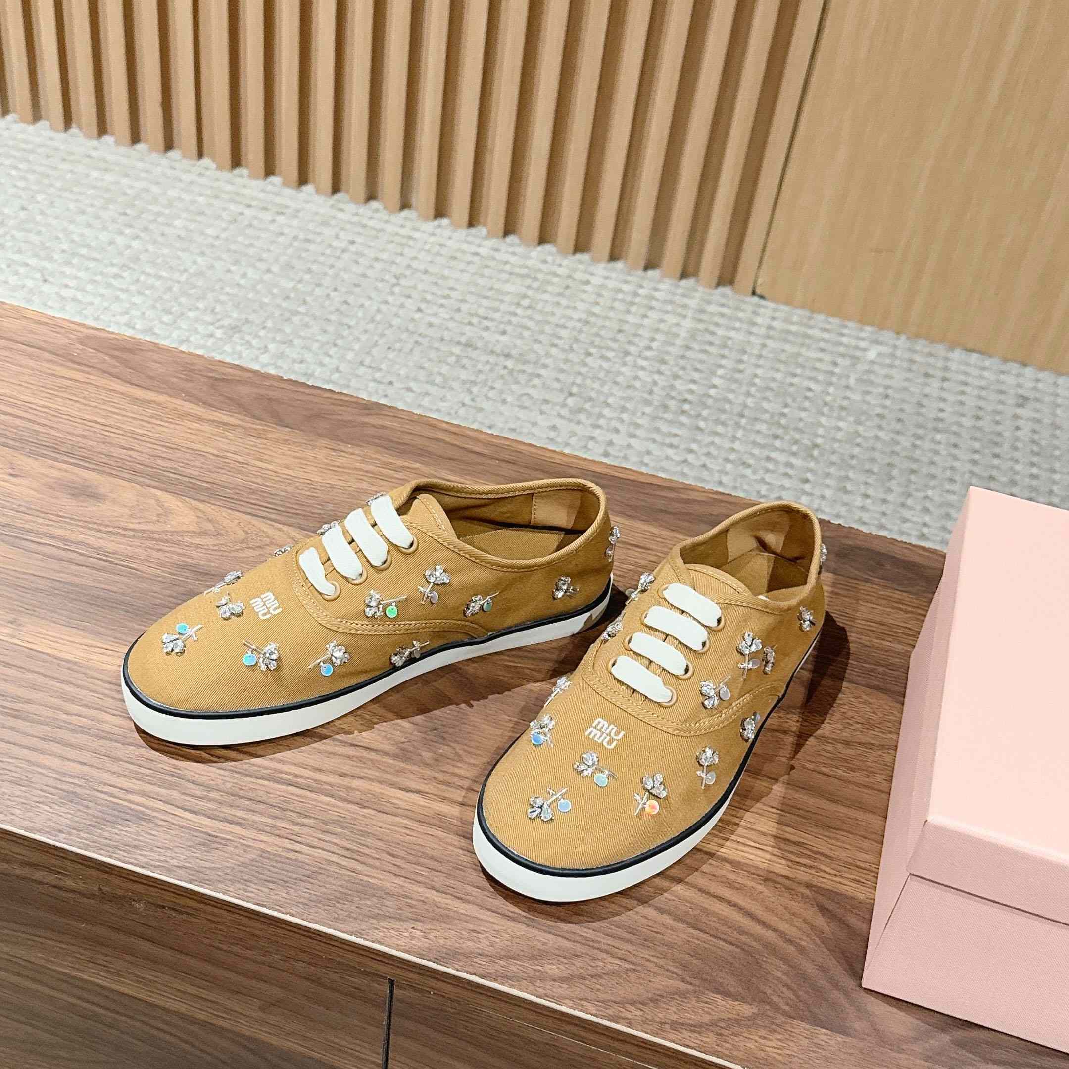 Miu Miu Embroidered Drill Sneakers - FashionPlug