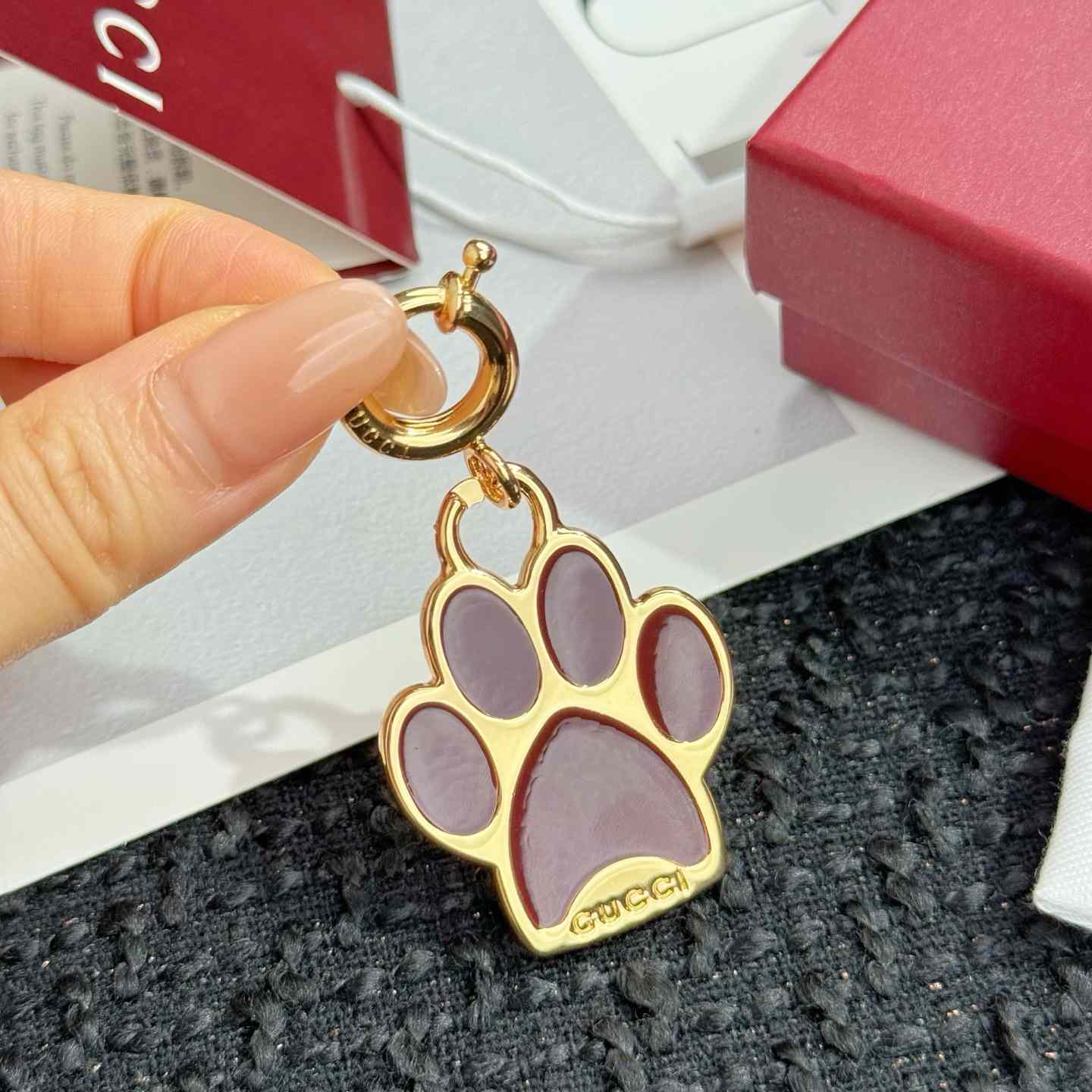 Gucci Paw-shaped Charm - FashionPlug