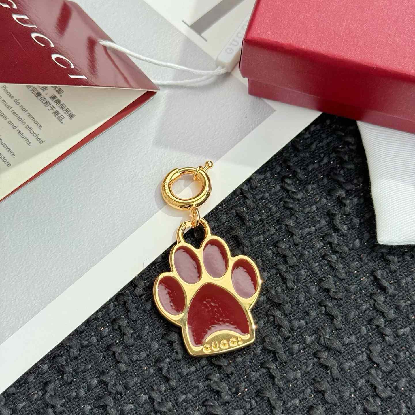 Gucci Paw-shaped Charm - FashionPlug
