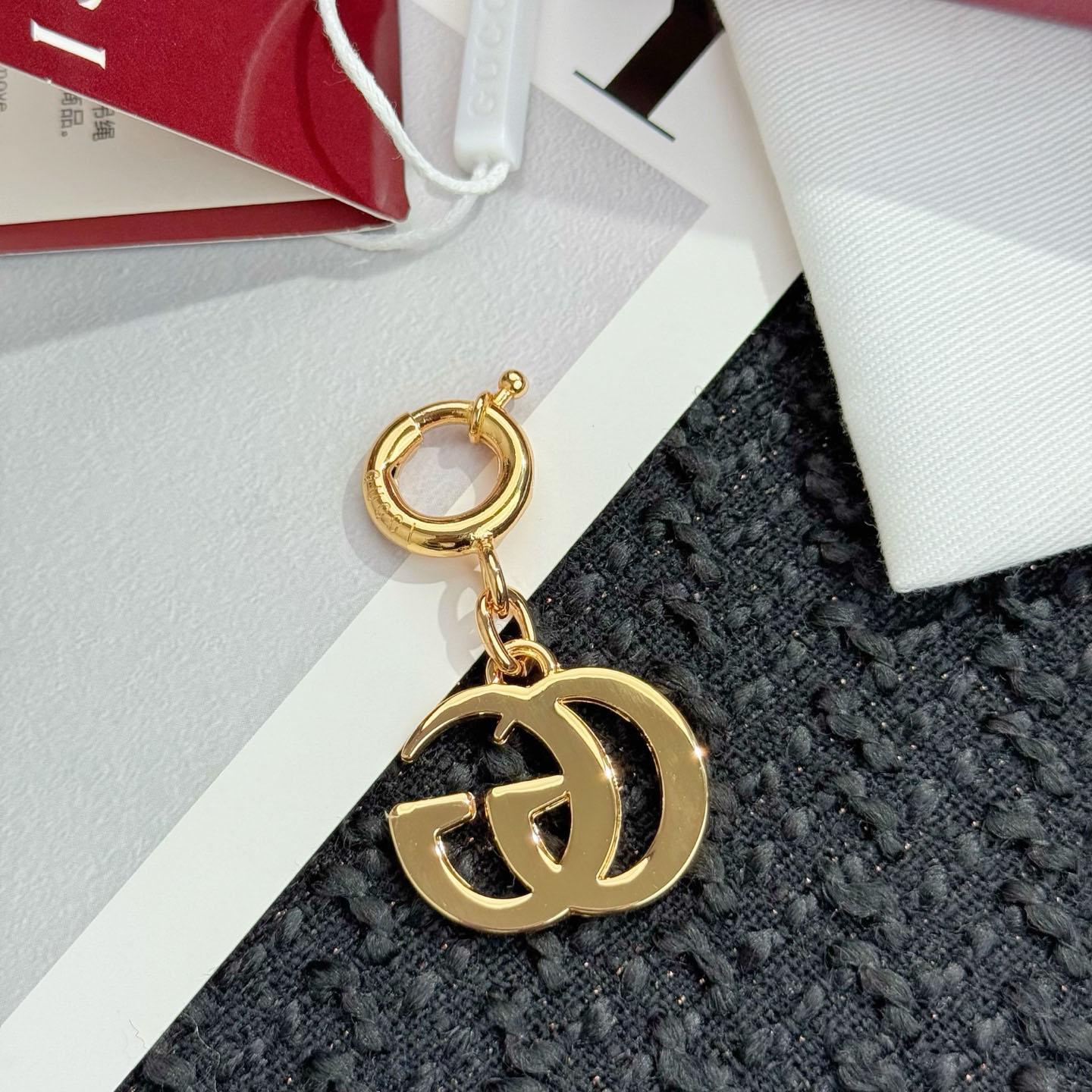 Gucci Double G Bag Charm - FashionPlug