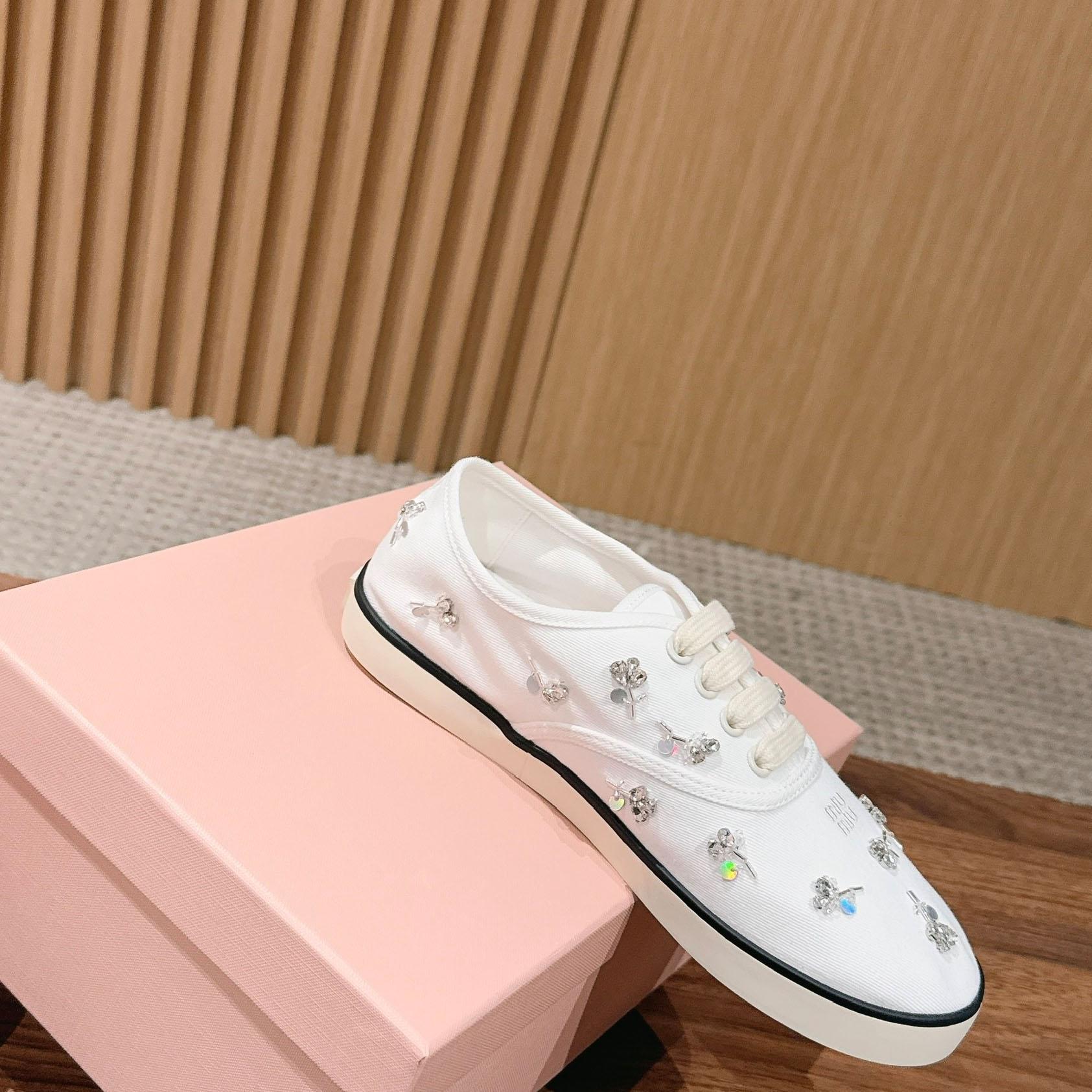 Miu Miu Embroidered Drill Sneakers - FashionPlug