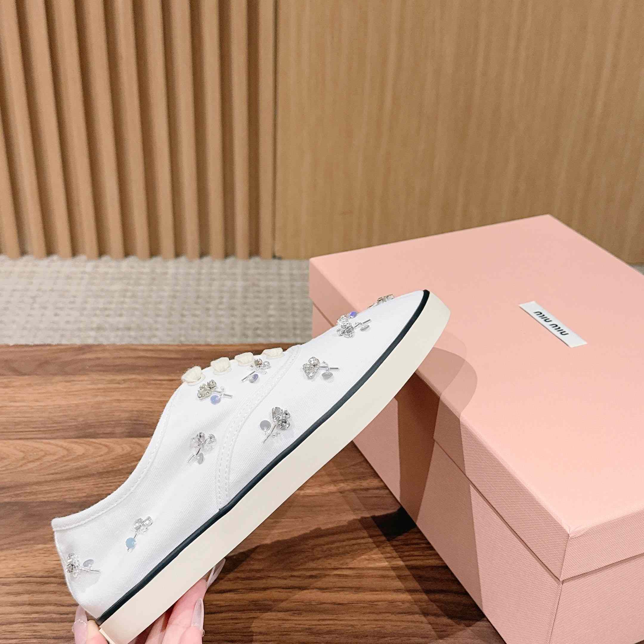 Miu Miu Embroidered Drill Sneakers - FashionPlug