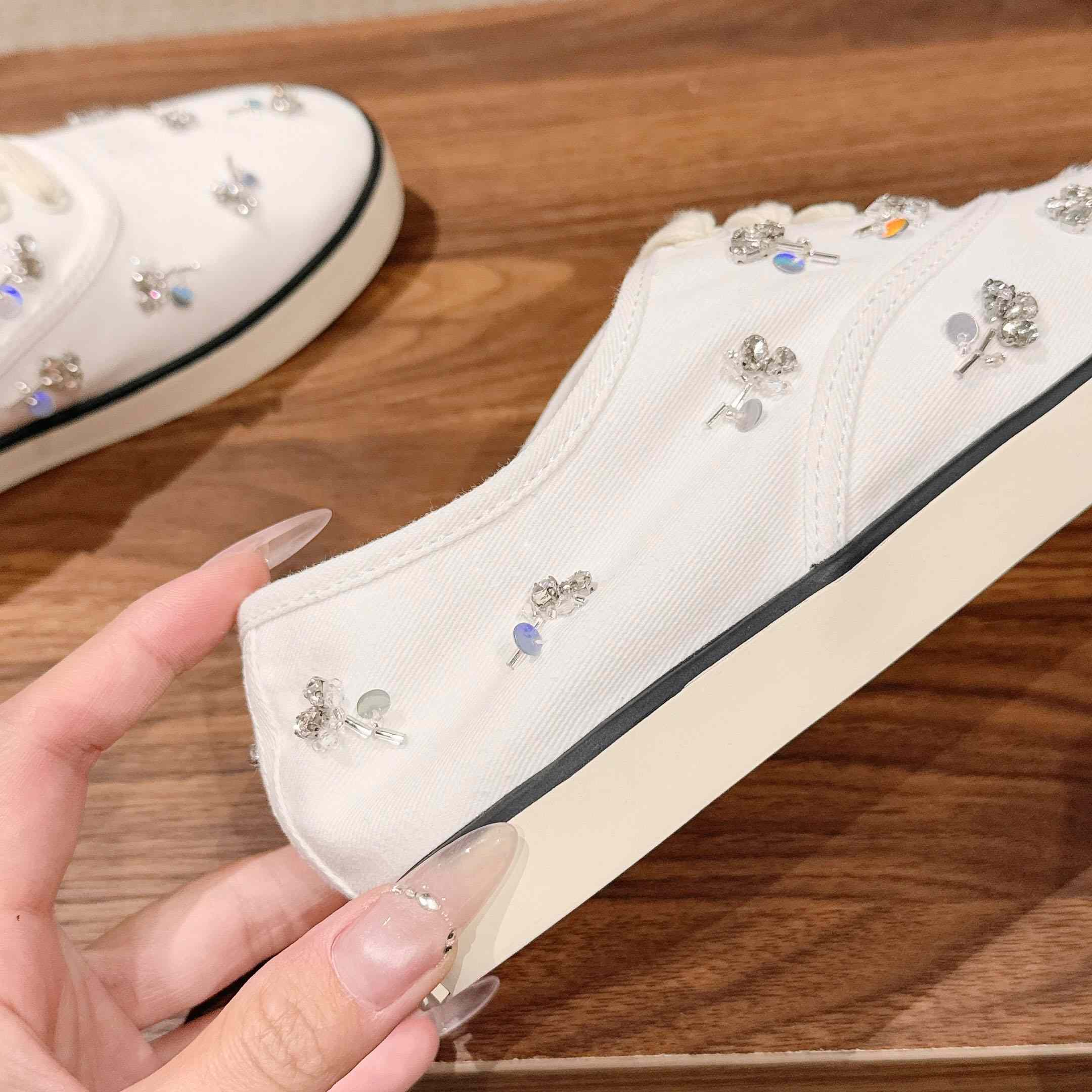 Miu Miu Embroidered Drill Sneakers - FashionPlug