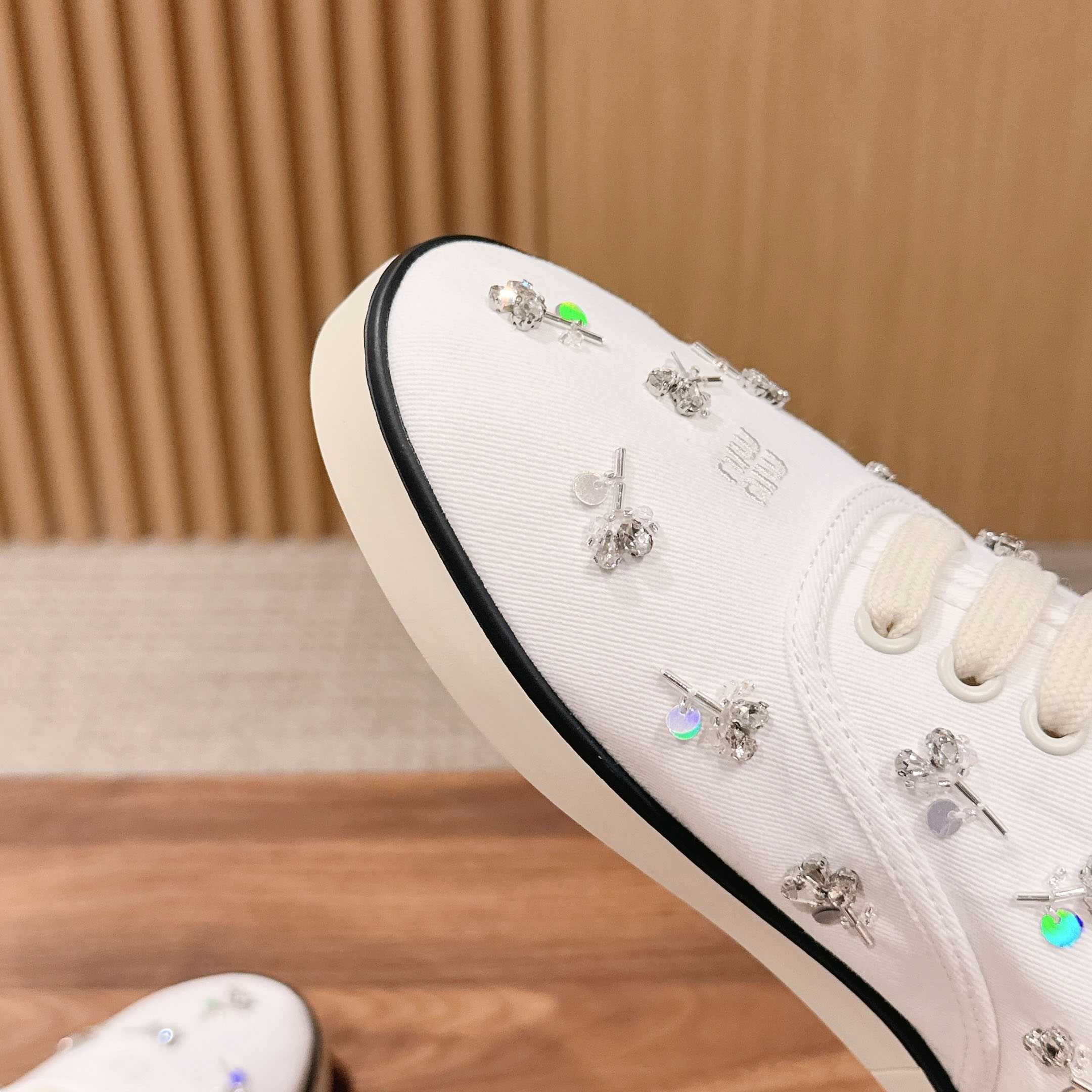 Miu Miu Embroidered Drill Sneakers - FashionPlug
