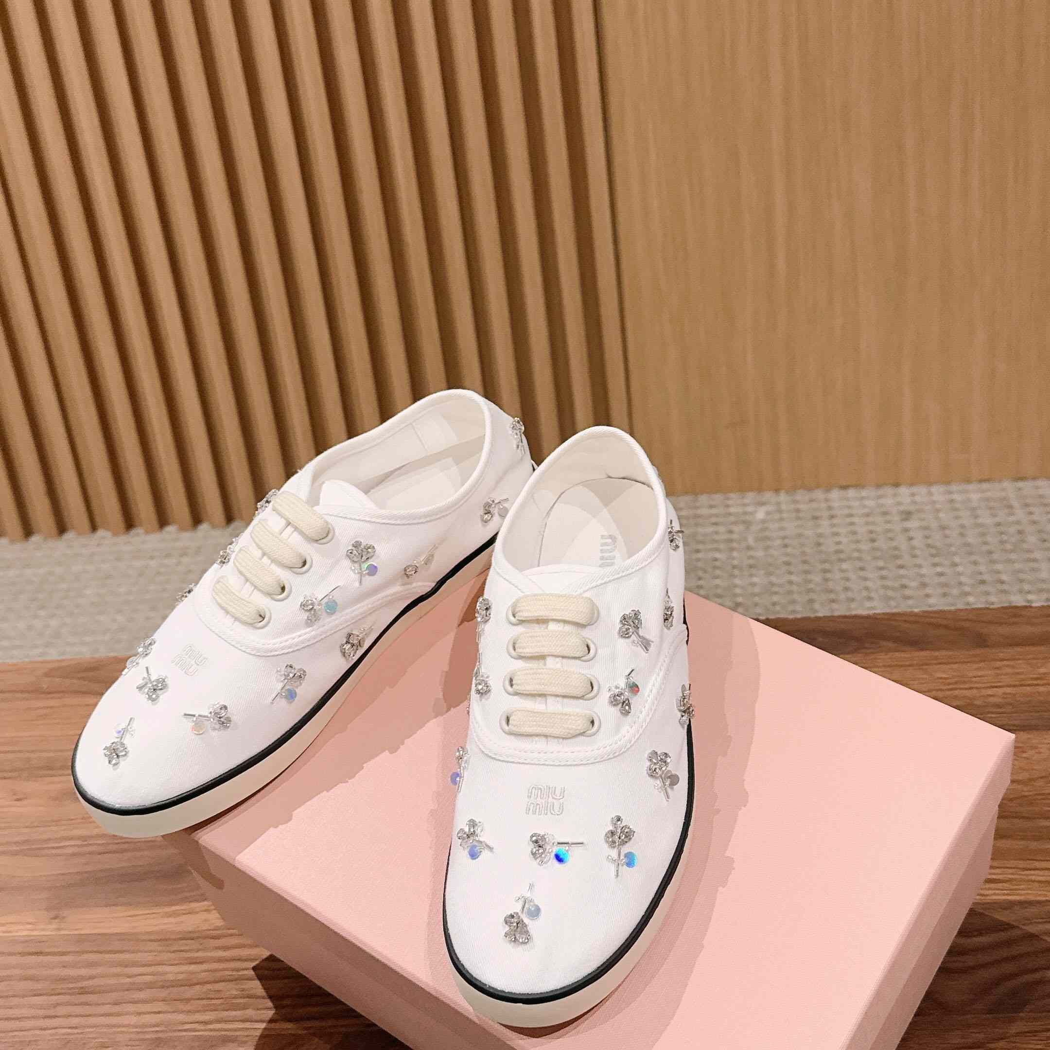 Miu Miu Embroidered Drill Sneakers - FashionPlug
