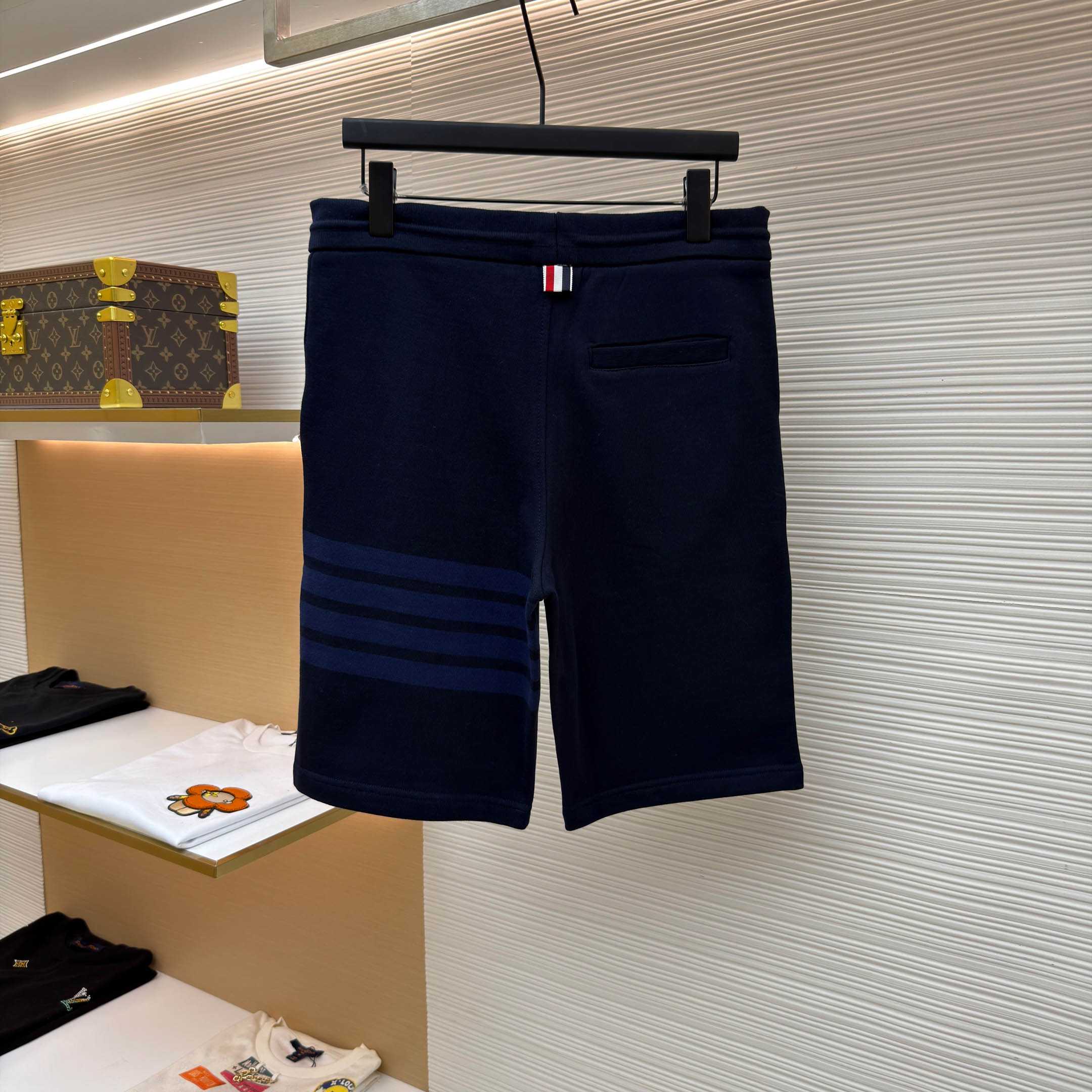 Thom Browne Navy Loopback 4-Bar Shorts - FashionPlug