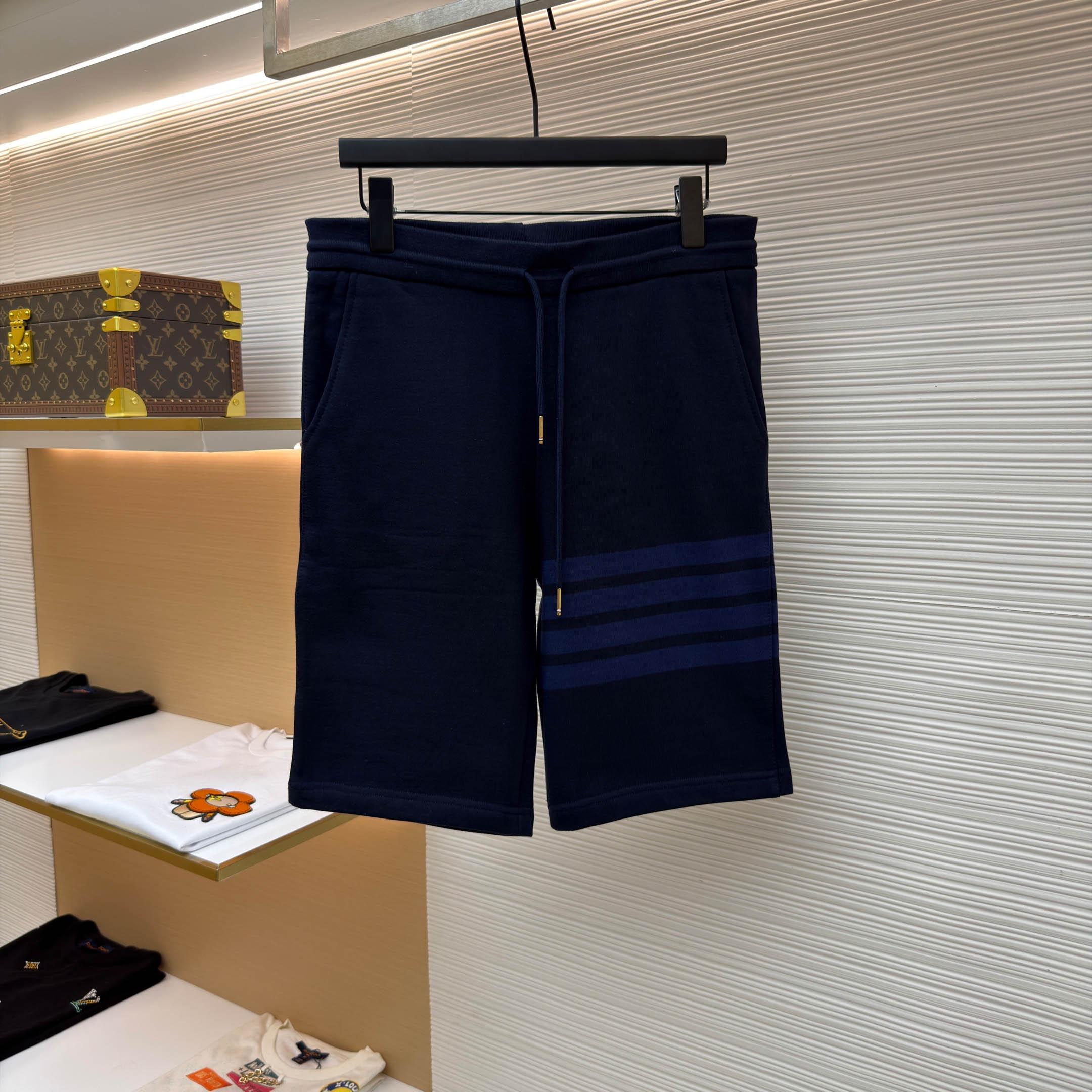 Thom Browne Navy Loopback 4-Bar Shorts - FashionPlug